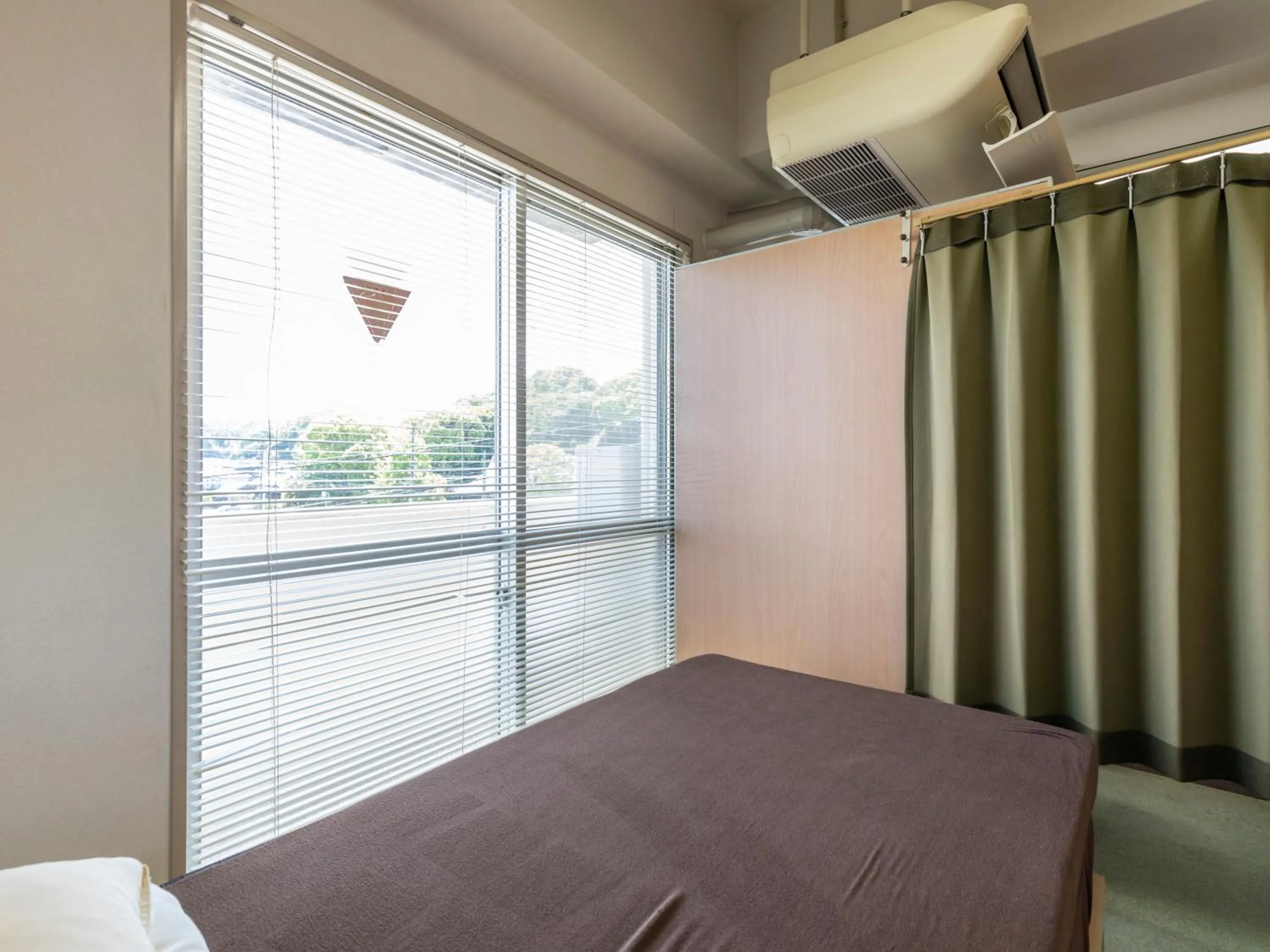 Bed in Omotenashi Hostel Miyajima