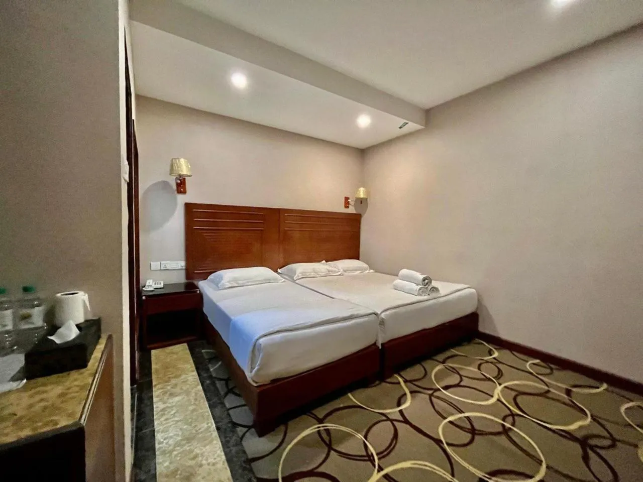 Bed in Fan Holiday Hotel