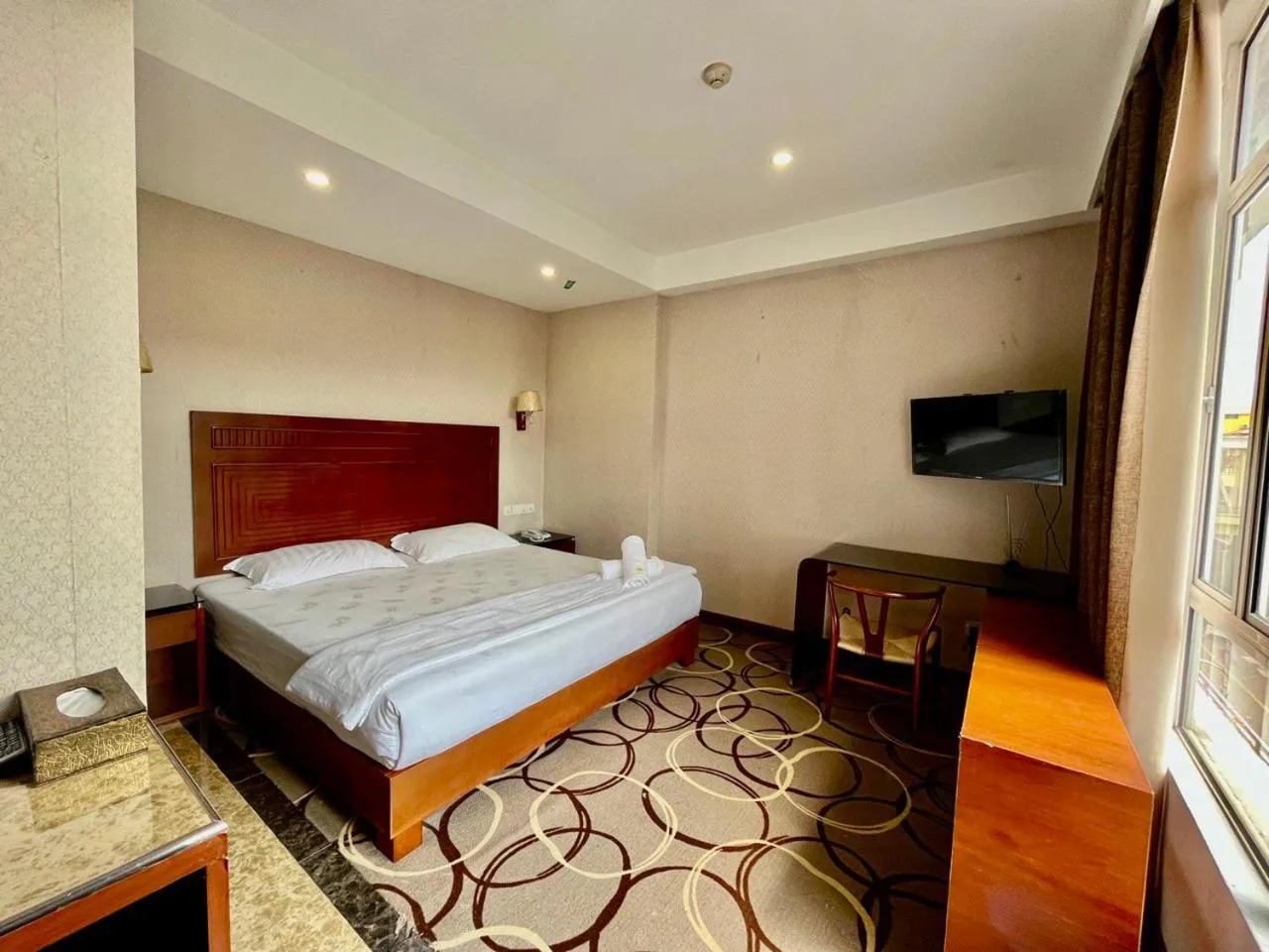 Bed in Fan Holiday Hotel