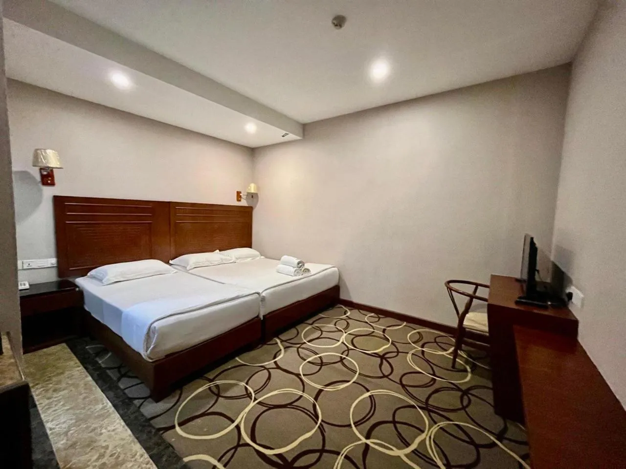 Bed in Fan Holiday Hotel