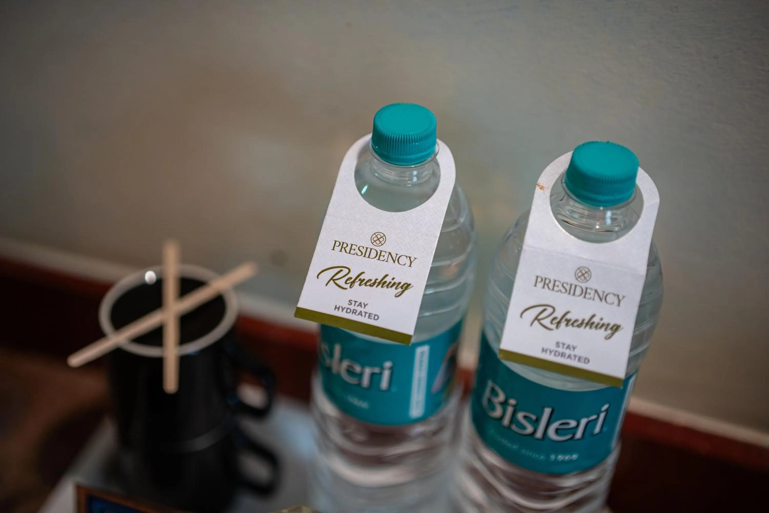 Text overlay in Hotel Presidency Kempegowda International Airport Bangalore