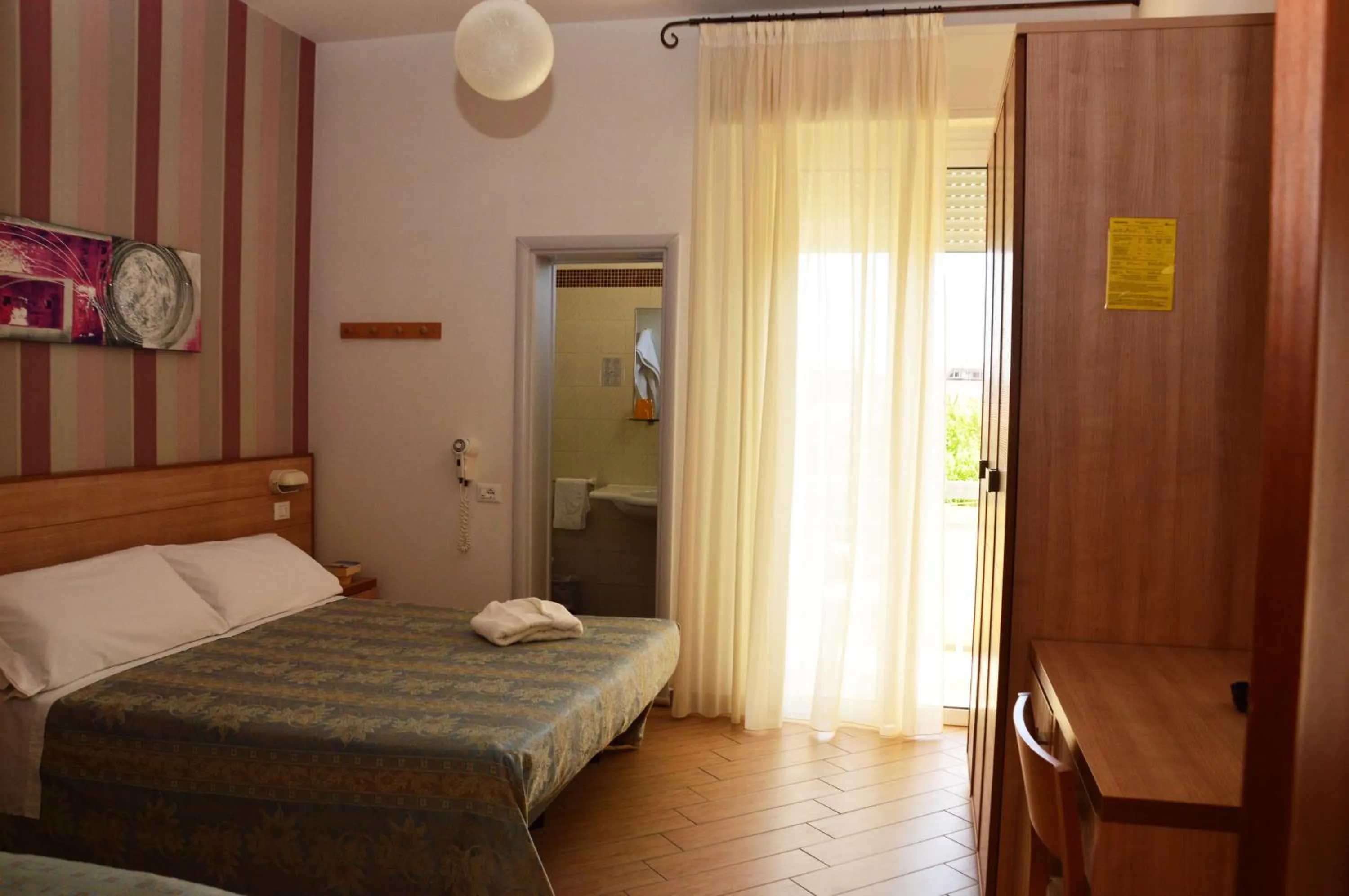 Bed in Hotel La Capinera