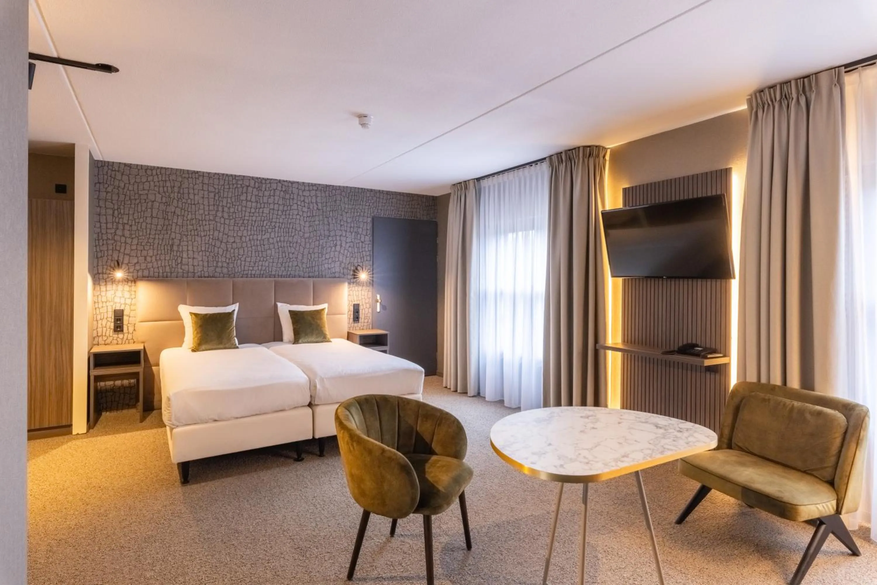 Bed in Hotel Asteria