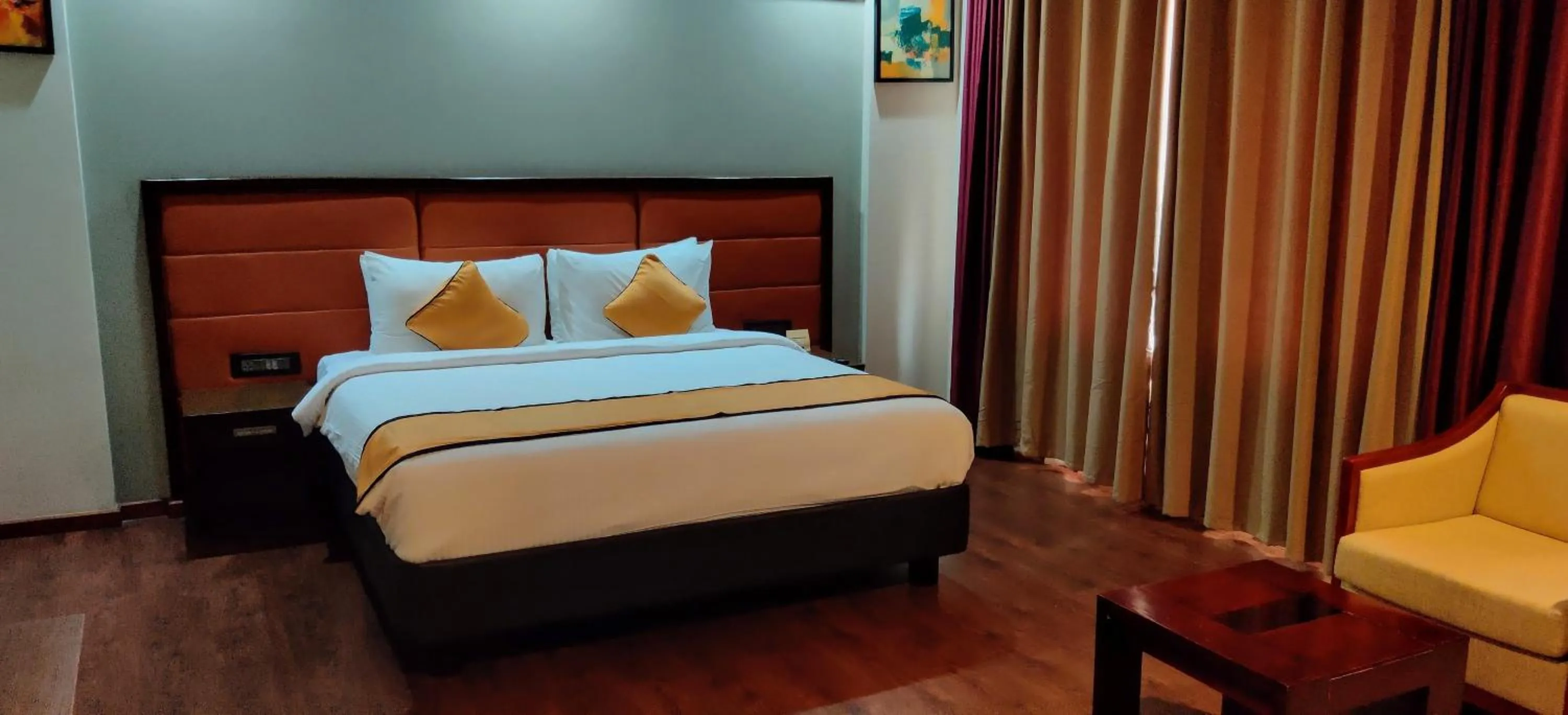 Bedroom, Bed in Dimora Hotel Thiruvananthapuram