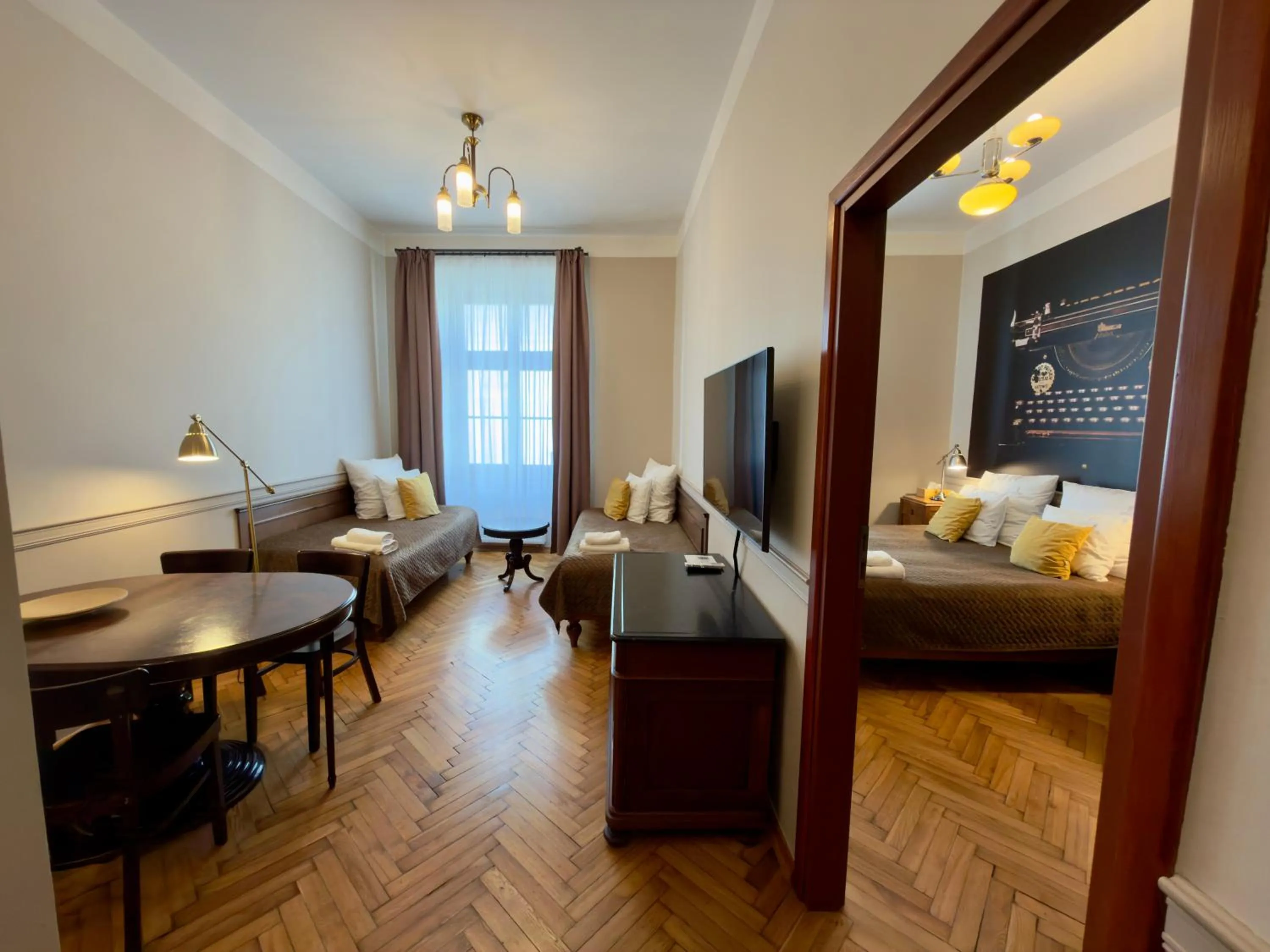 TV and multimedia, Bed in Scharffenberg Apartments Main Square