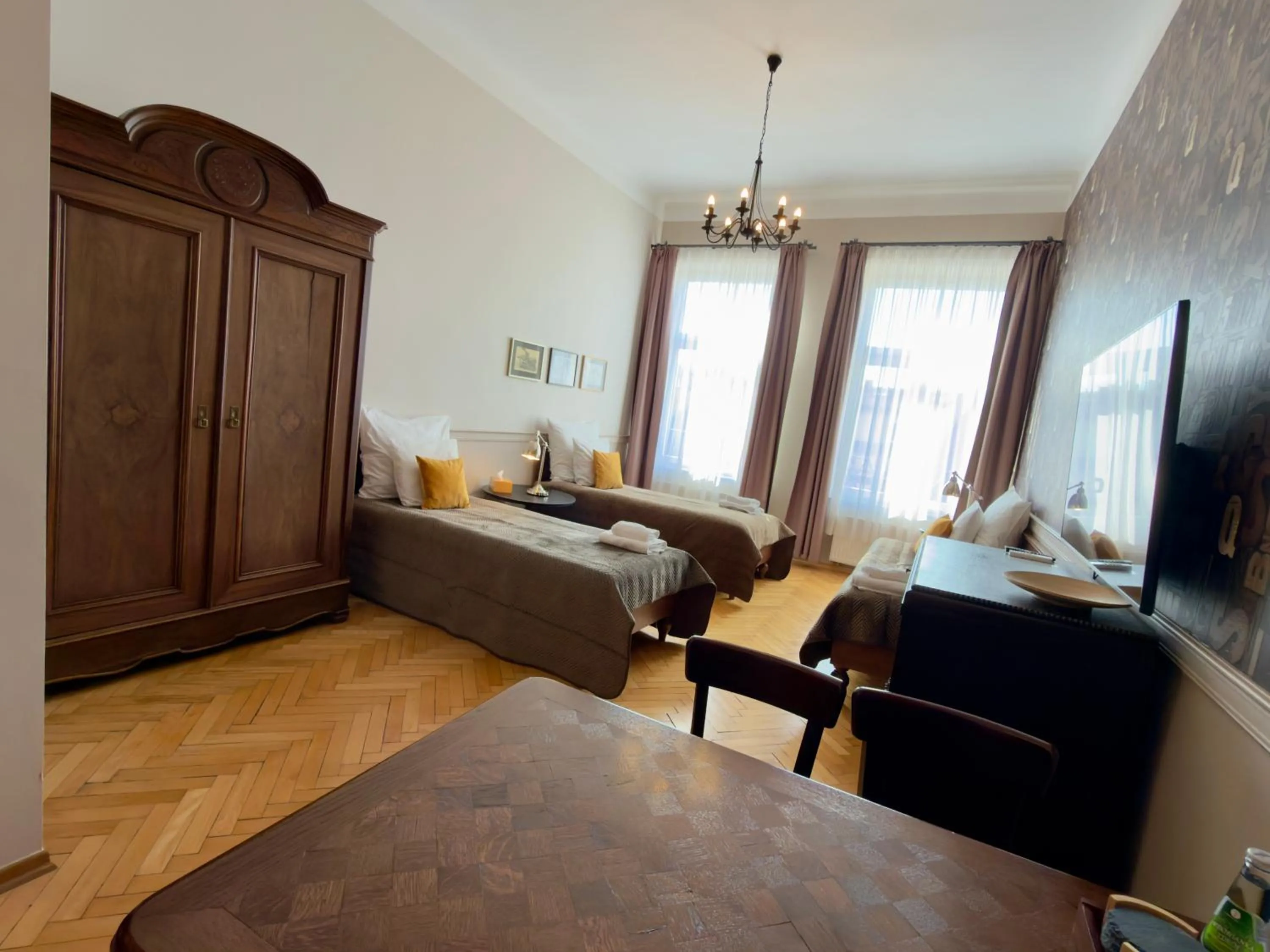 Photo of the whole room, Bed in Scharffenberg Apartments Main Square