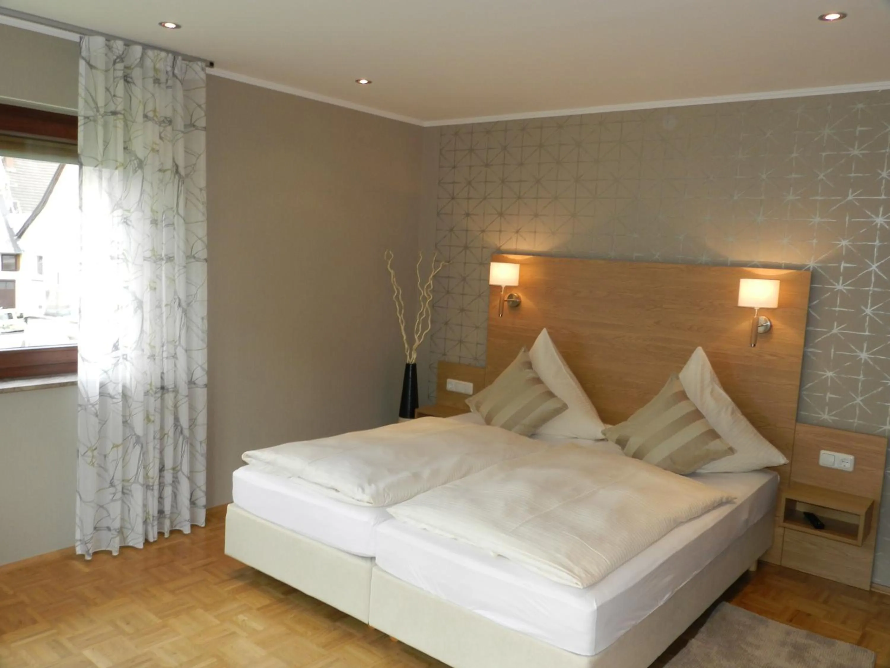 Photo of the whole room, Bed in Weingut Stassen