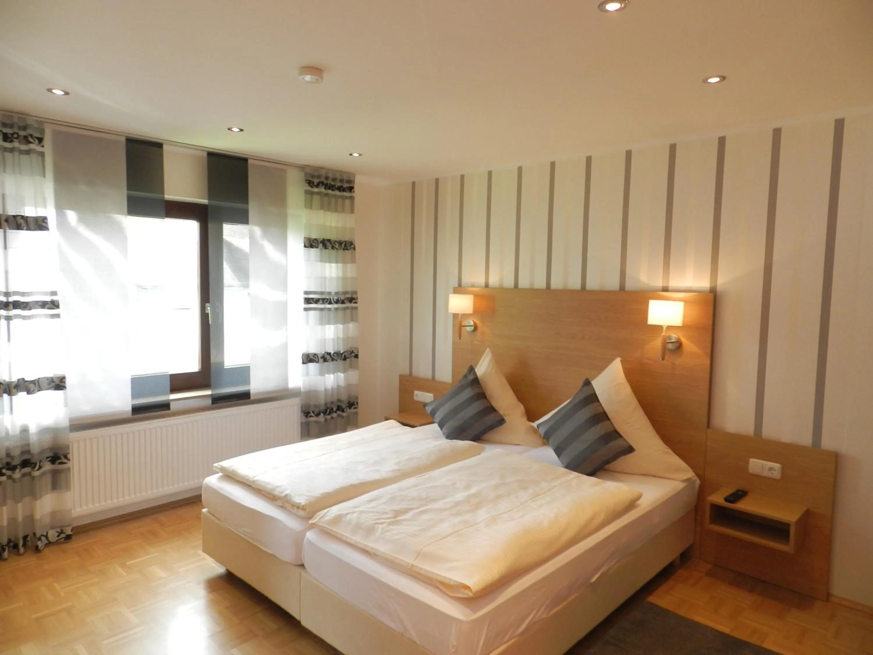 Photo of the whole room, Bed in Weingut Stassen