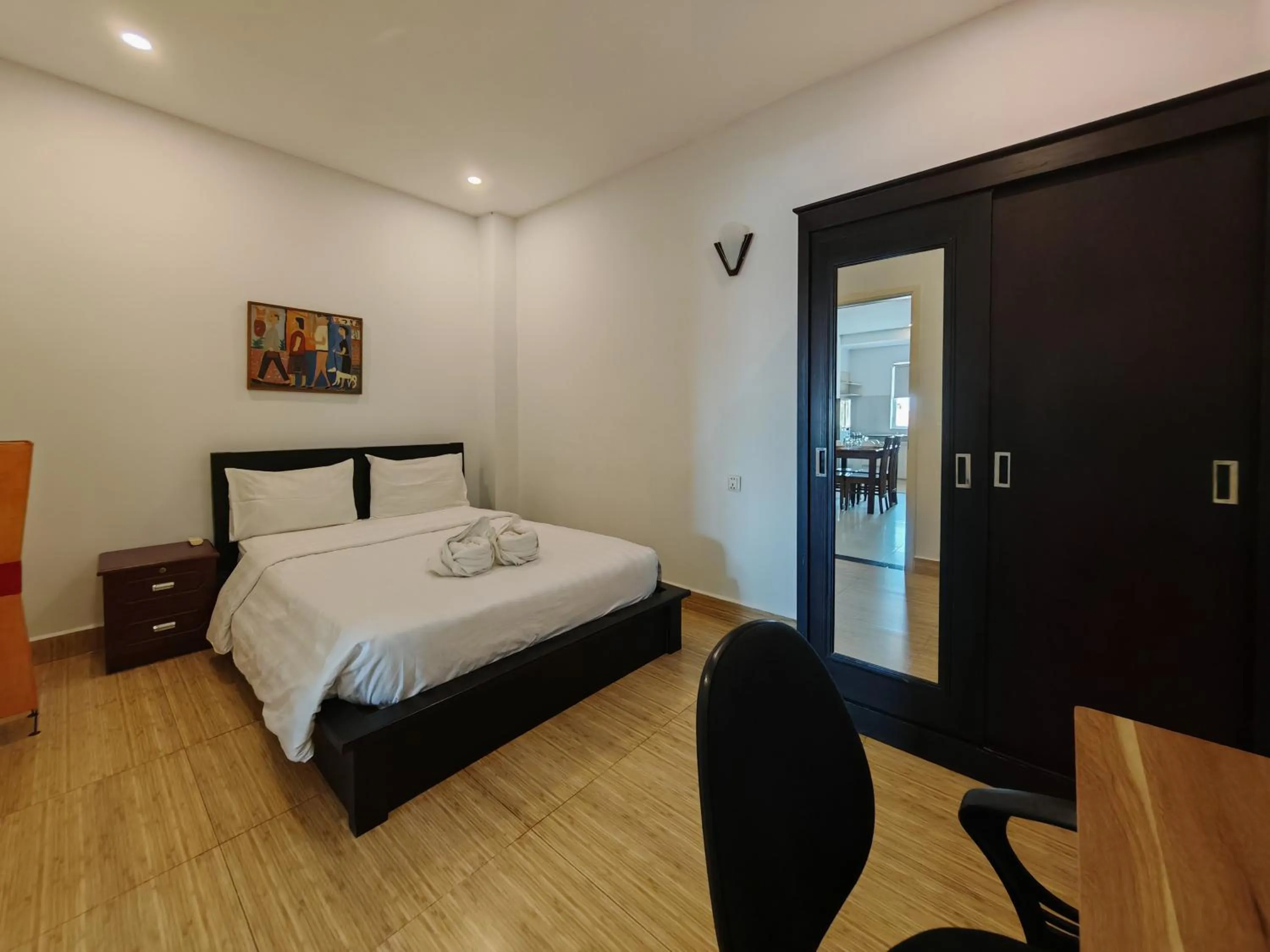 Bed in La Belle Residence