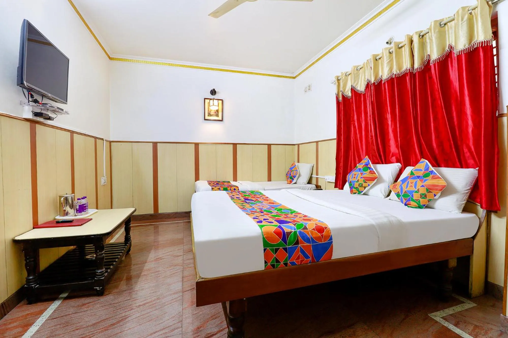 Photo of the whole room in FabHotel Shivaals Residency - Rajajinagar