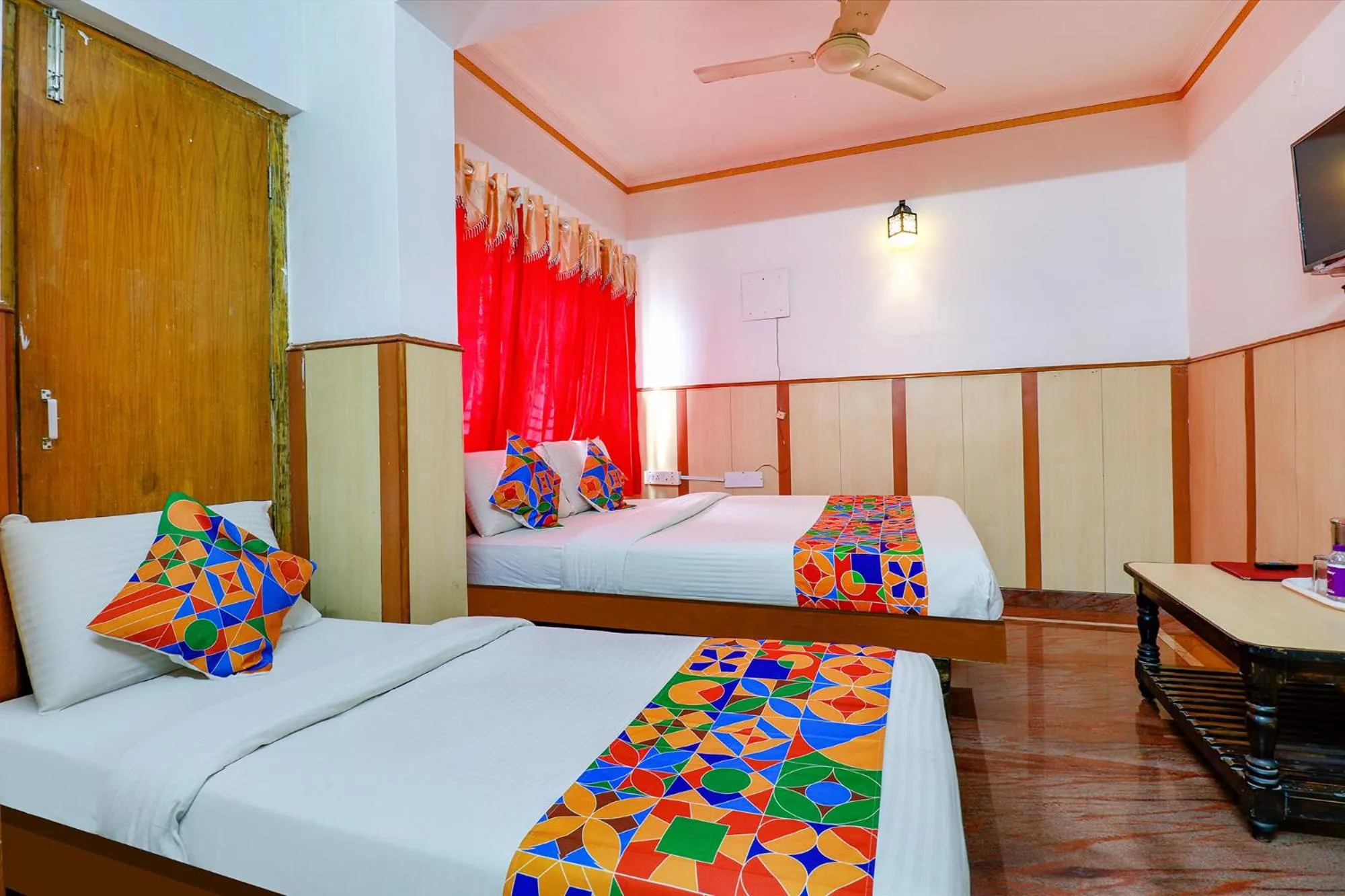 Photo of the whole room in FabHotel Shivaals Residency - Rajajinagar