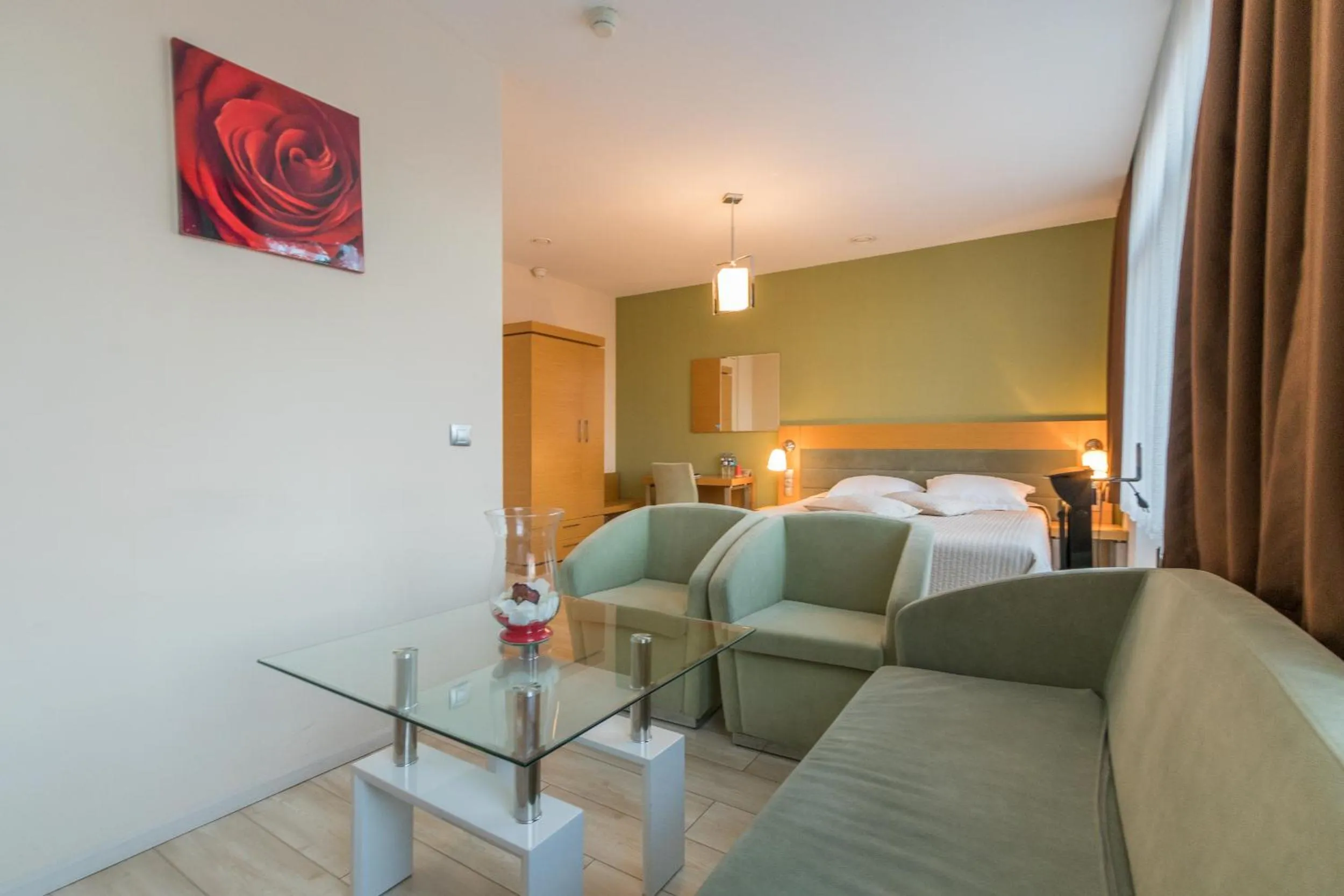 Seating area, Bed in Hotel Port