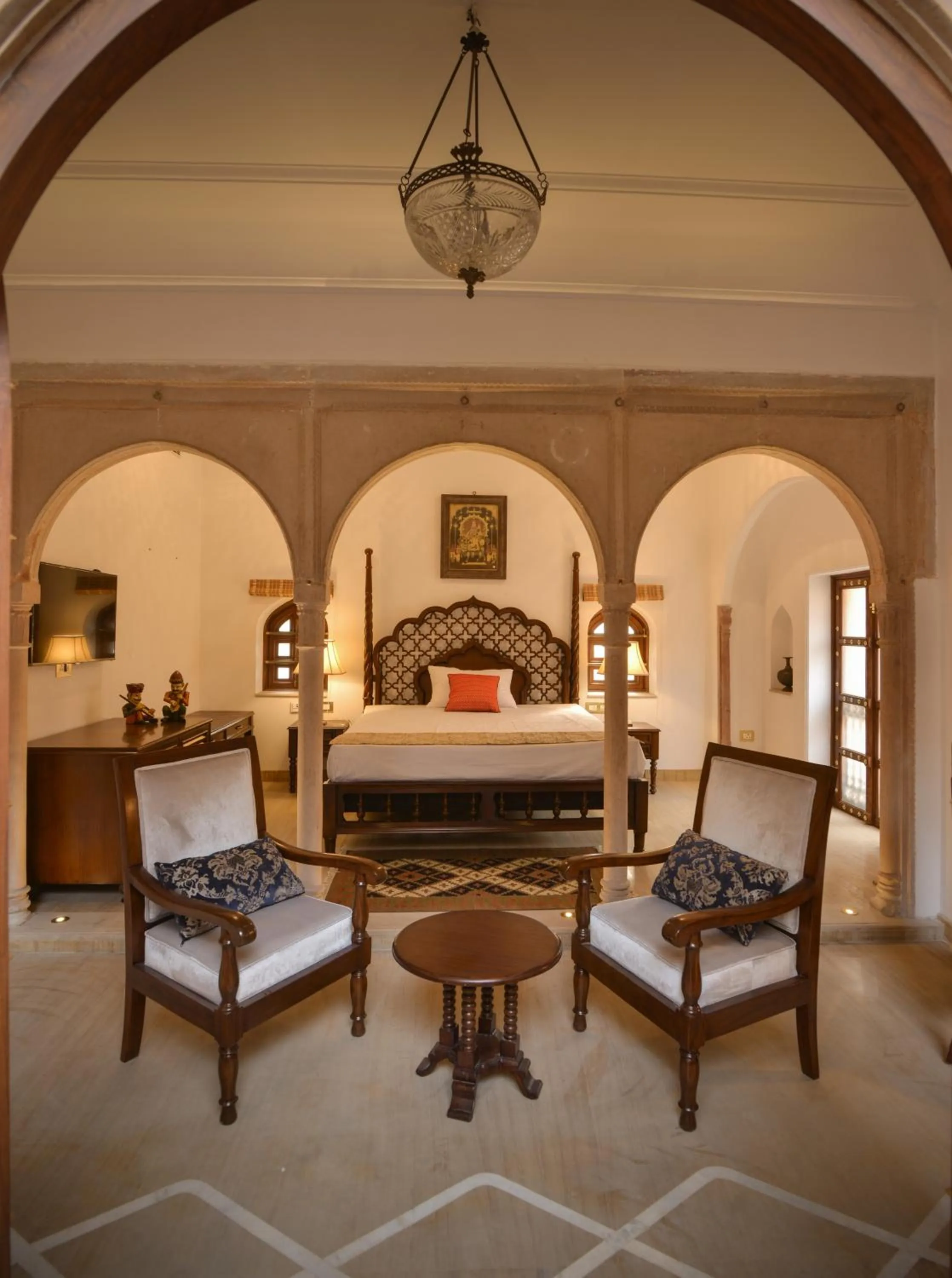 Photo of the whole room in Haveli Dharampura & Golden Haveli- UNESCO awarded Boutique Heritage Hotel