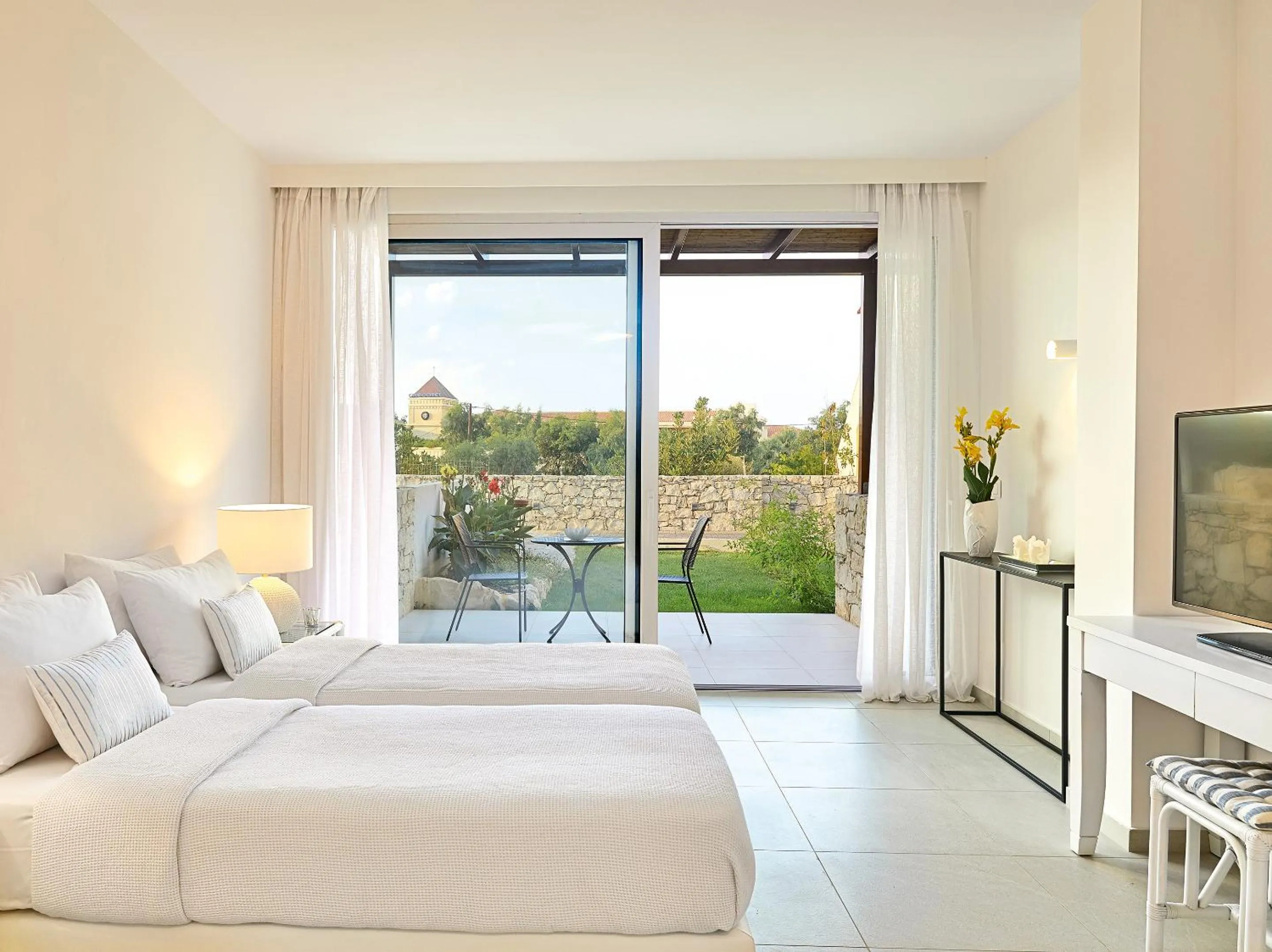 Bed in Grecotel Marine Palace & Aqua Park