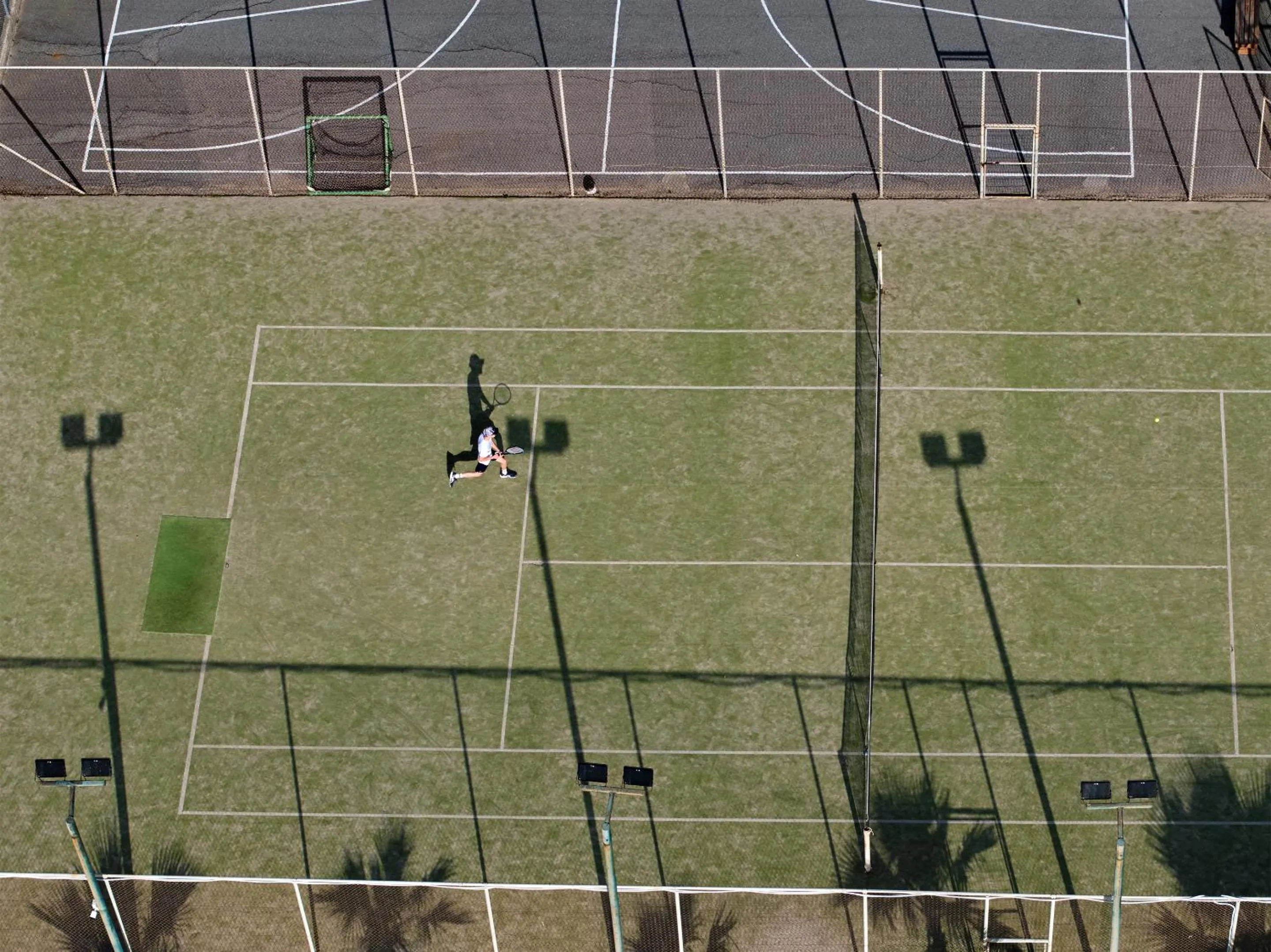 Tennis court in Grecotel Marine Palace & Aqua Park