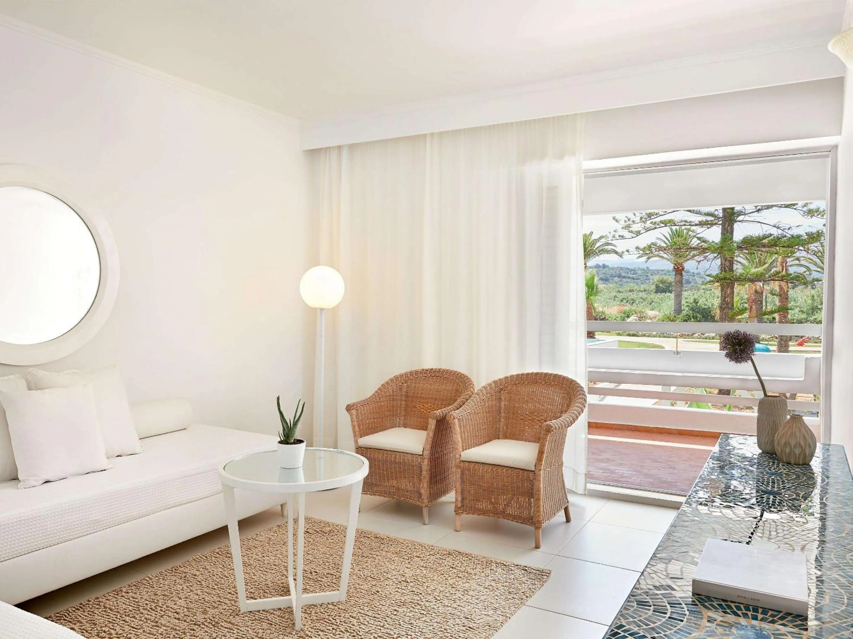 Living room, Bed in Grecotel LUXME White