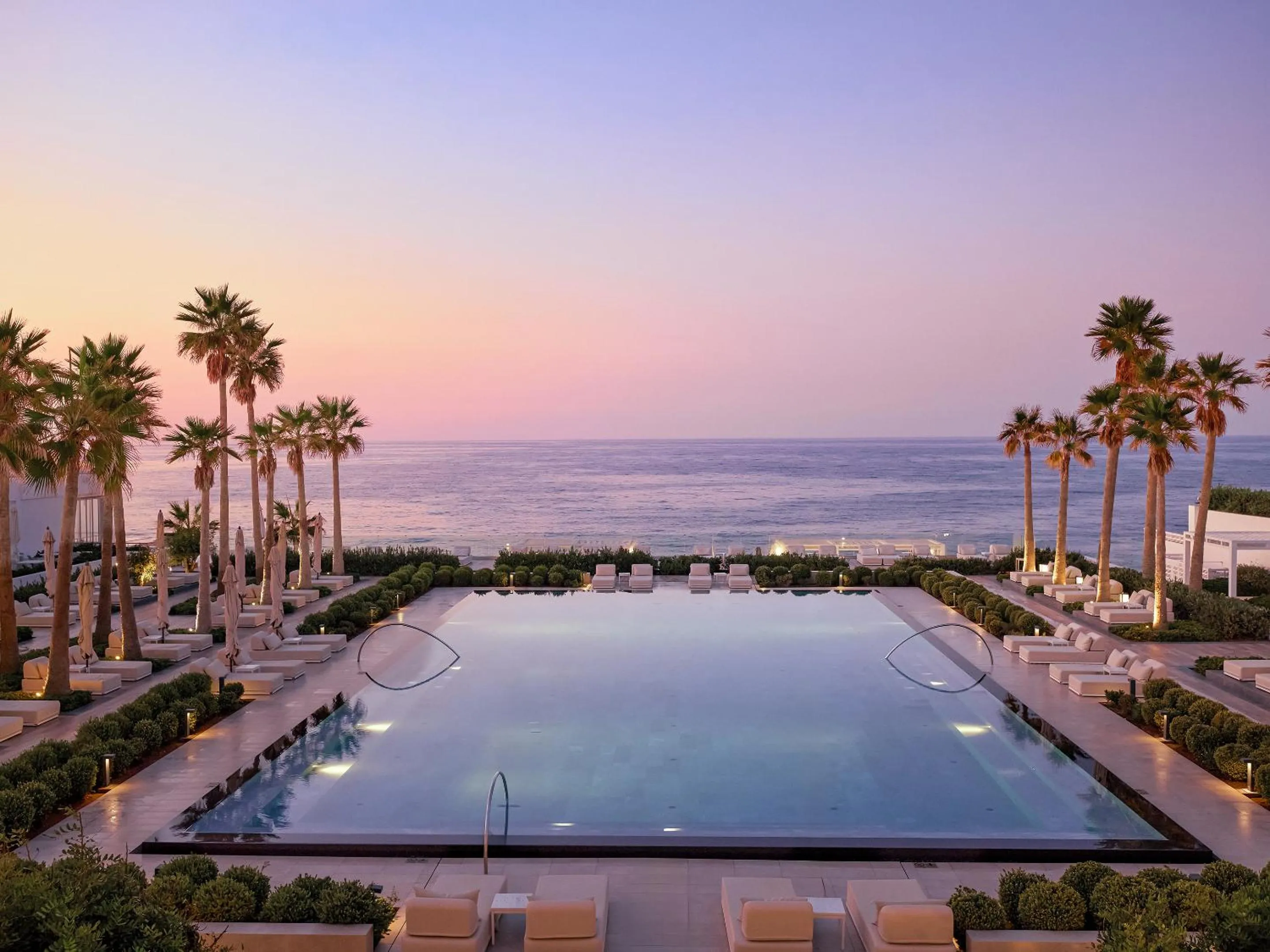 Swimming pool in Grecotel LUXME White