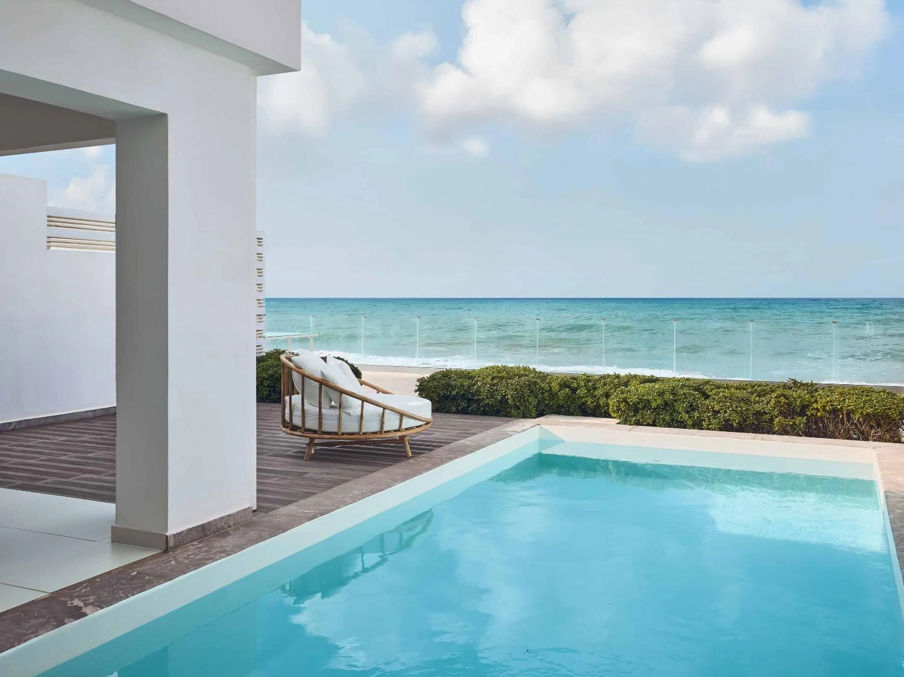 Swimming pool in Grecotel LUXME White