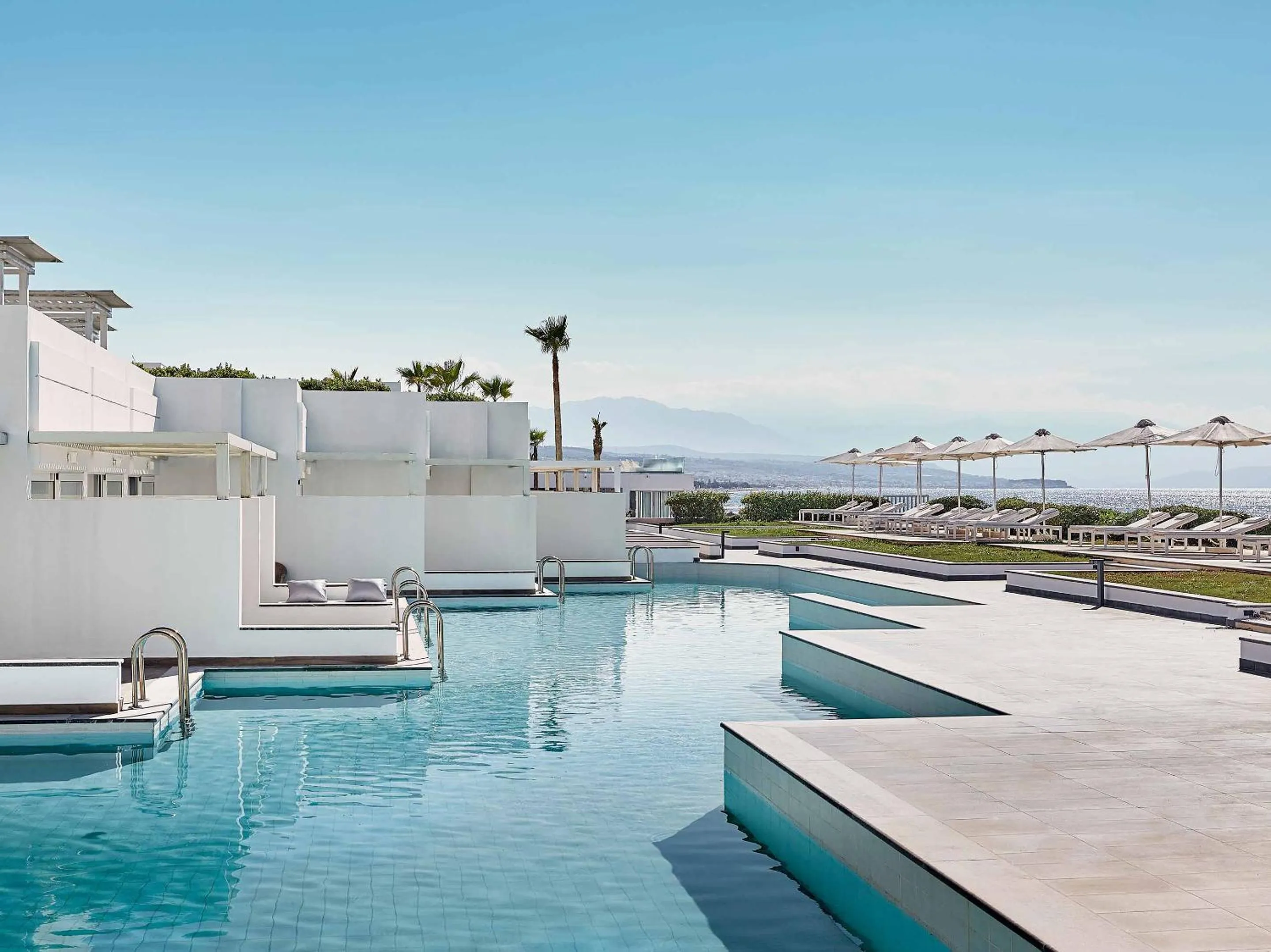 Swimming pool in Grecotel LUXME White