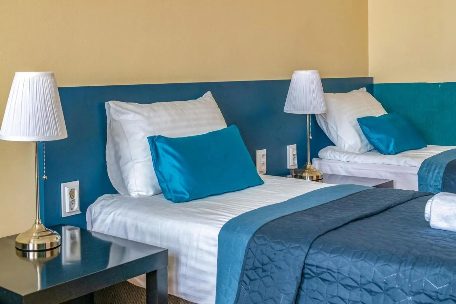 Bed in Corvin Hotel Budapest Residence