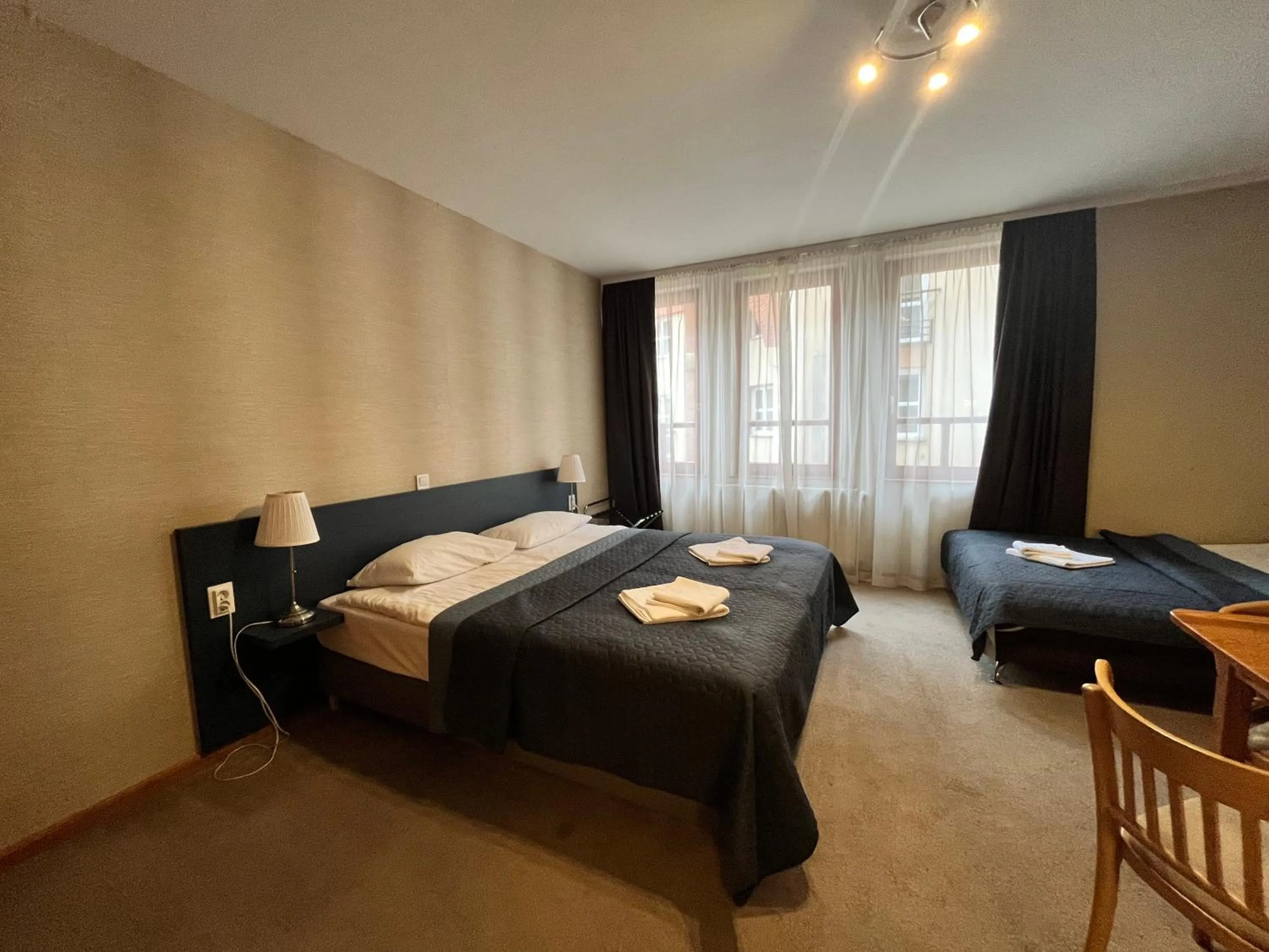 Bed in Corvin Hotel Budapest Residence