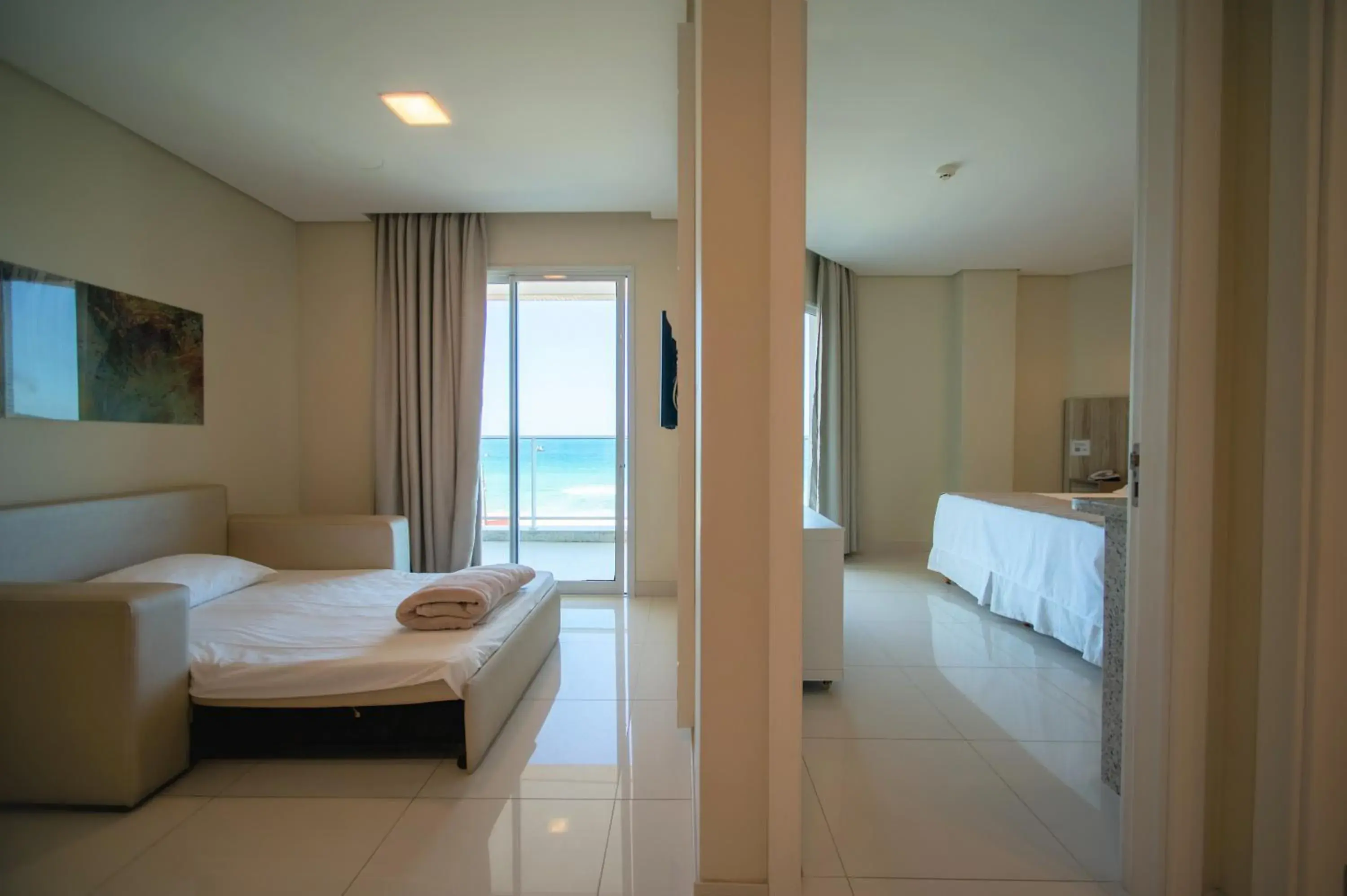 Triple Room with Sea View in Slaviero Hotel Ingleses Convention Triple Room with Sea View in Slaviero Hotel Ingleses Convention