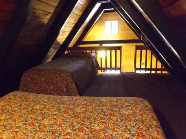 Bed in Arizona Mountain Inn & Cabins