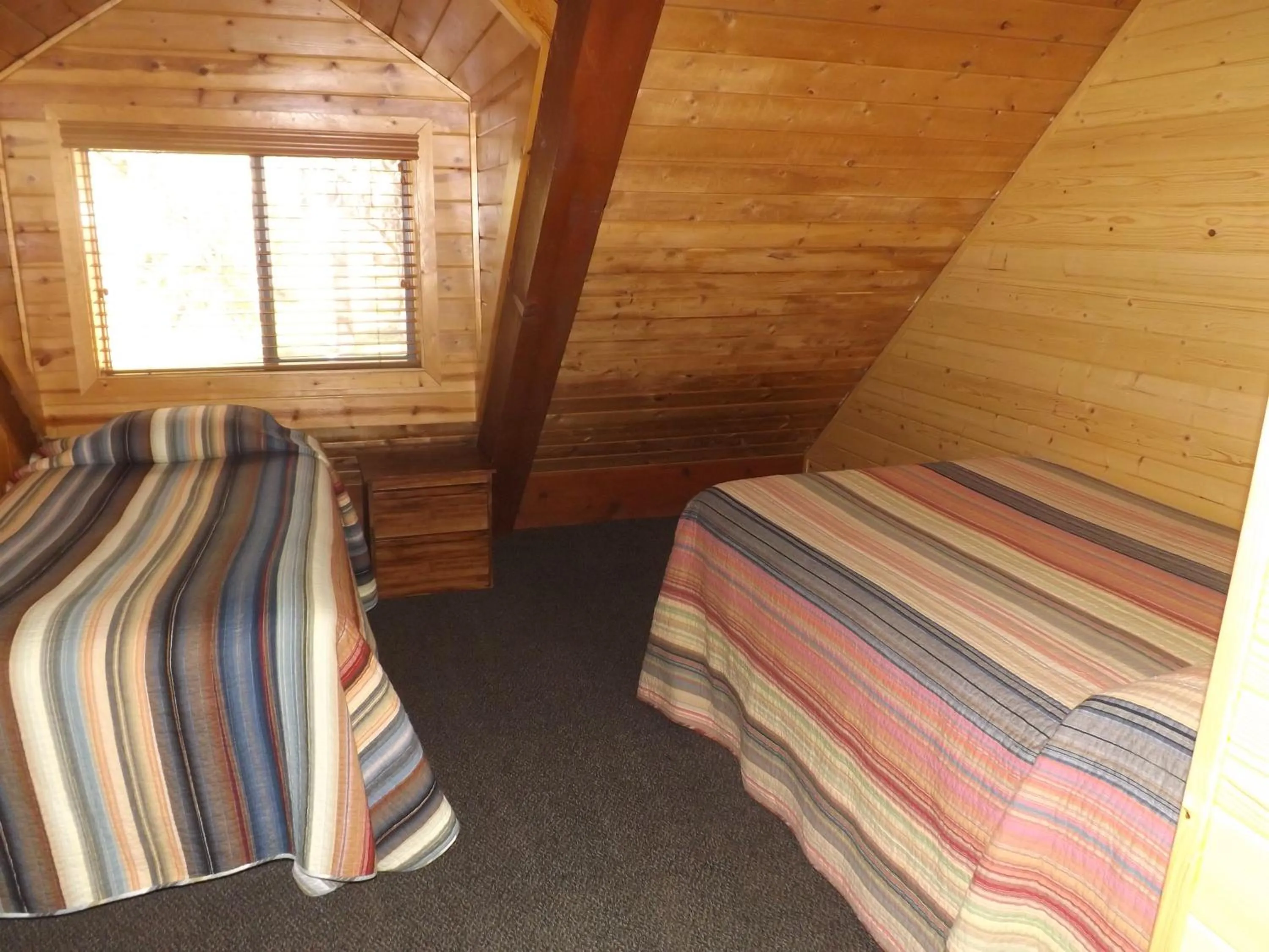 Bed in Arizona Mountain Inn & Cabins