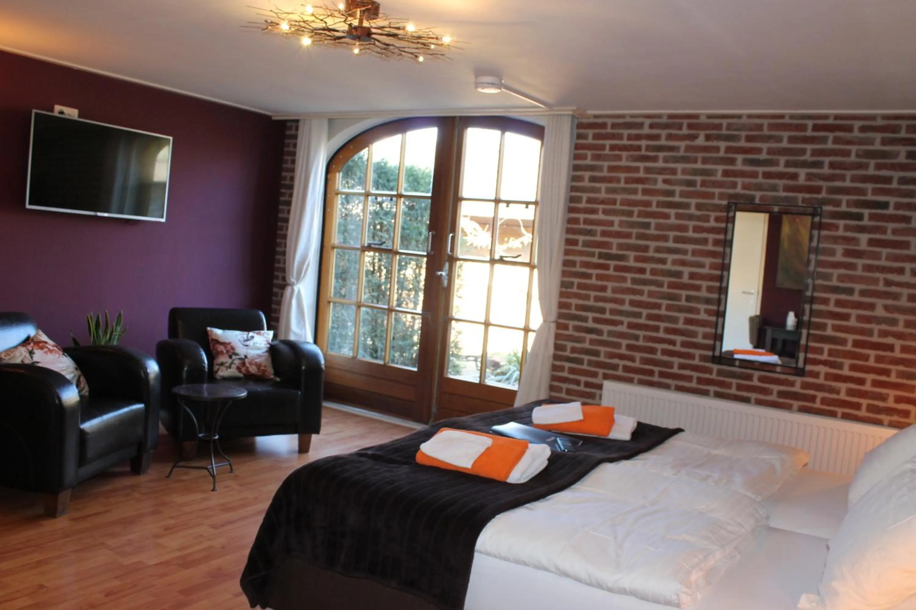 Living room, Bed in Boutique Hotel Nieuw Beusink