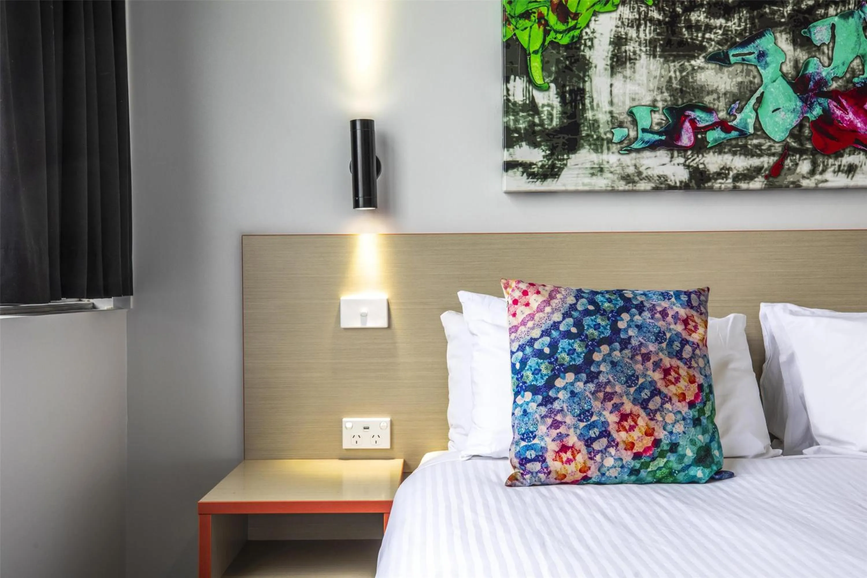 Bedroom, Bed in Nightcap at Ashley Hotel