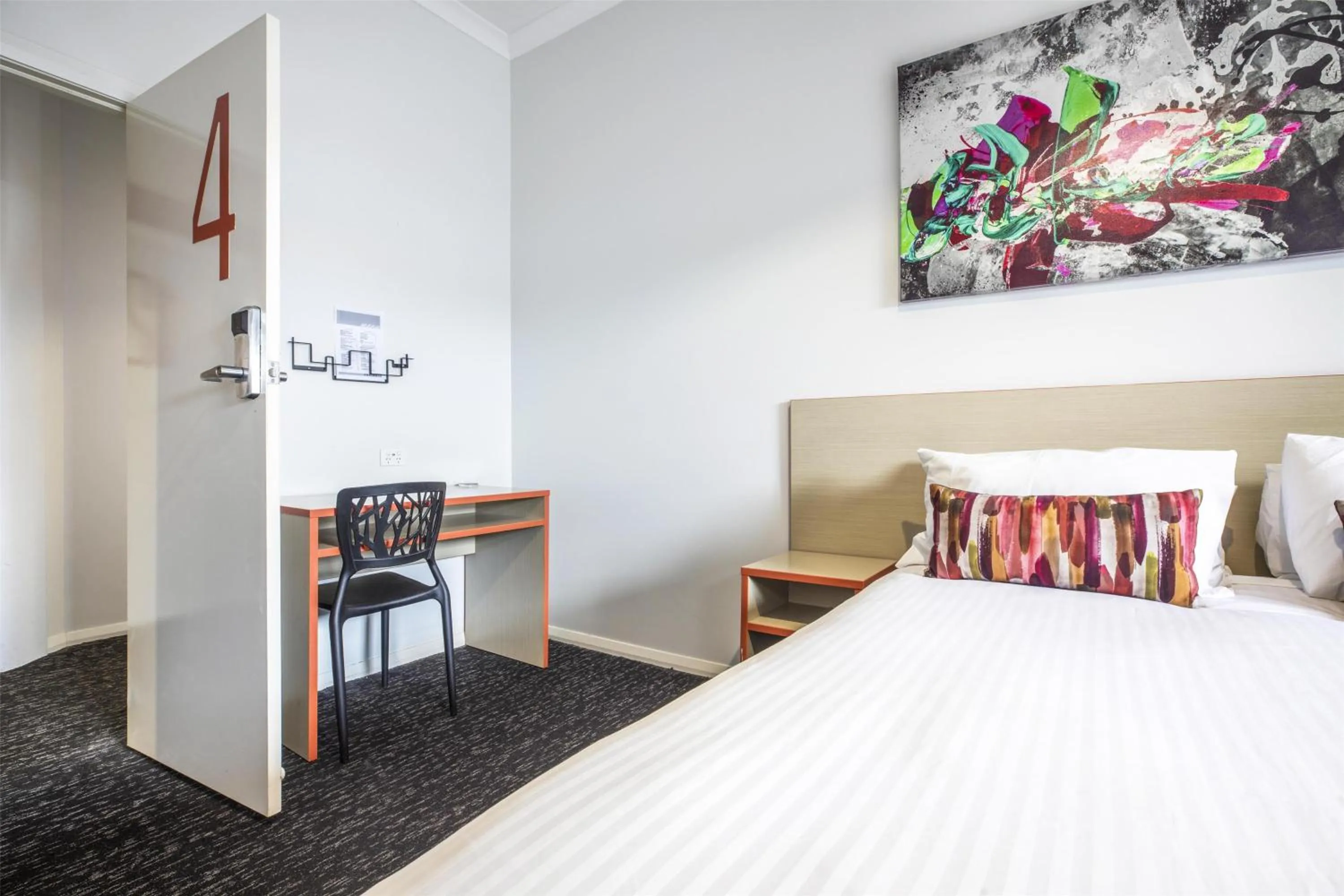 Bedroom, Bed in Nightcap at Ashley Hotel