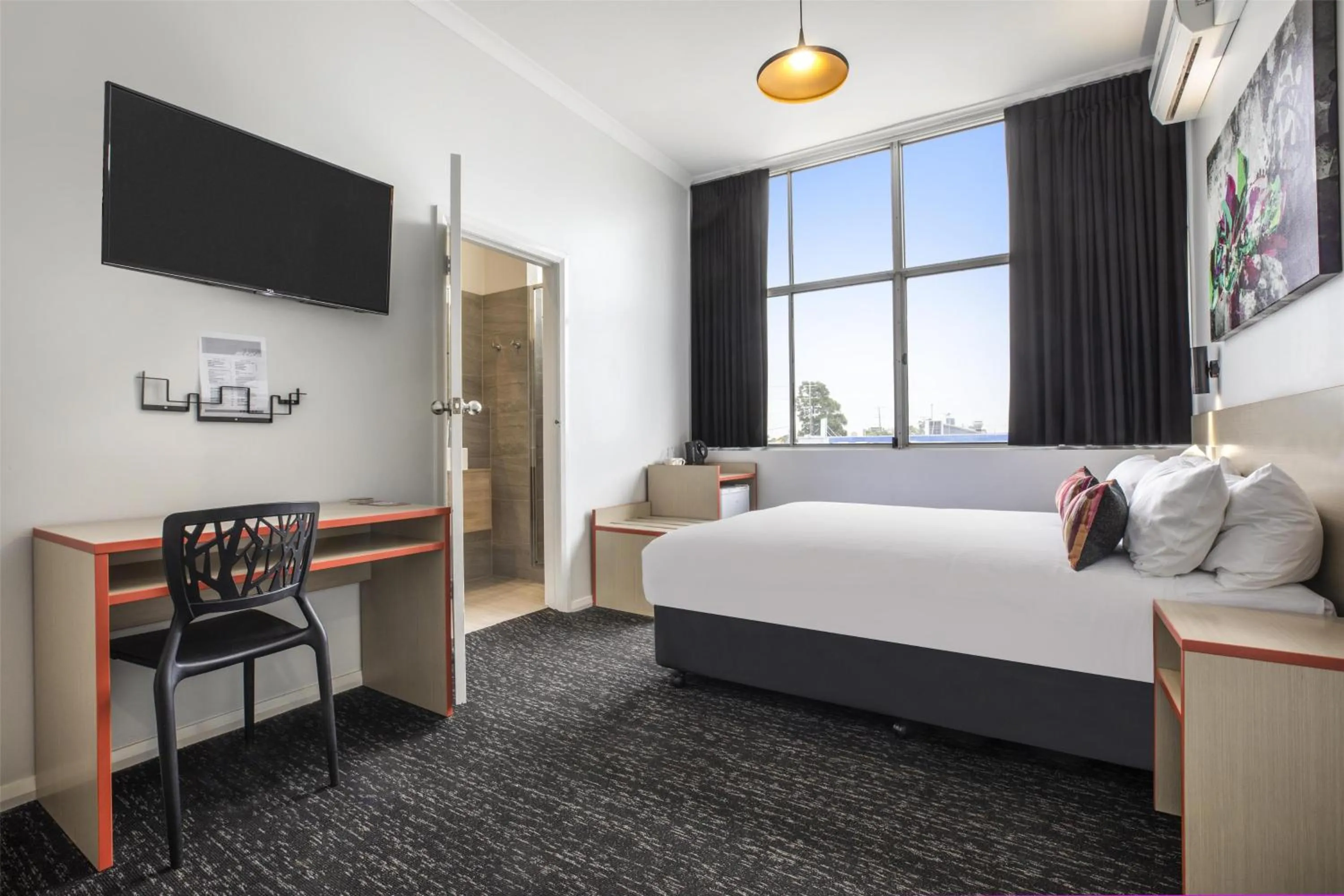 Bedroom, Bed in Nightcap at Ashley Hotel