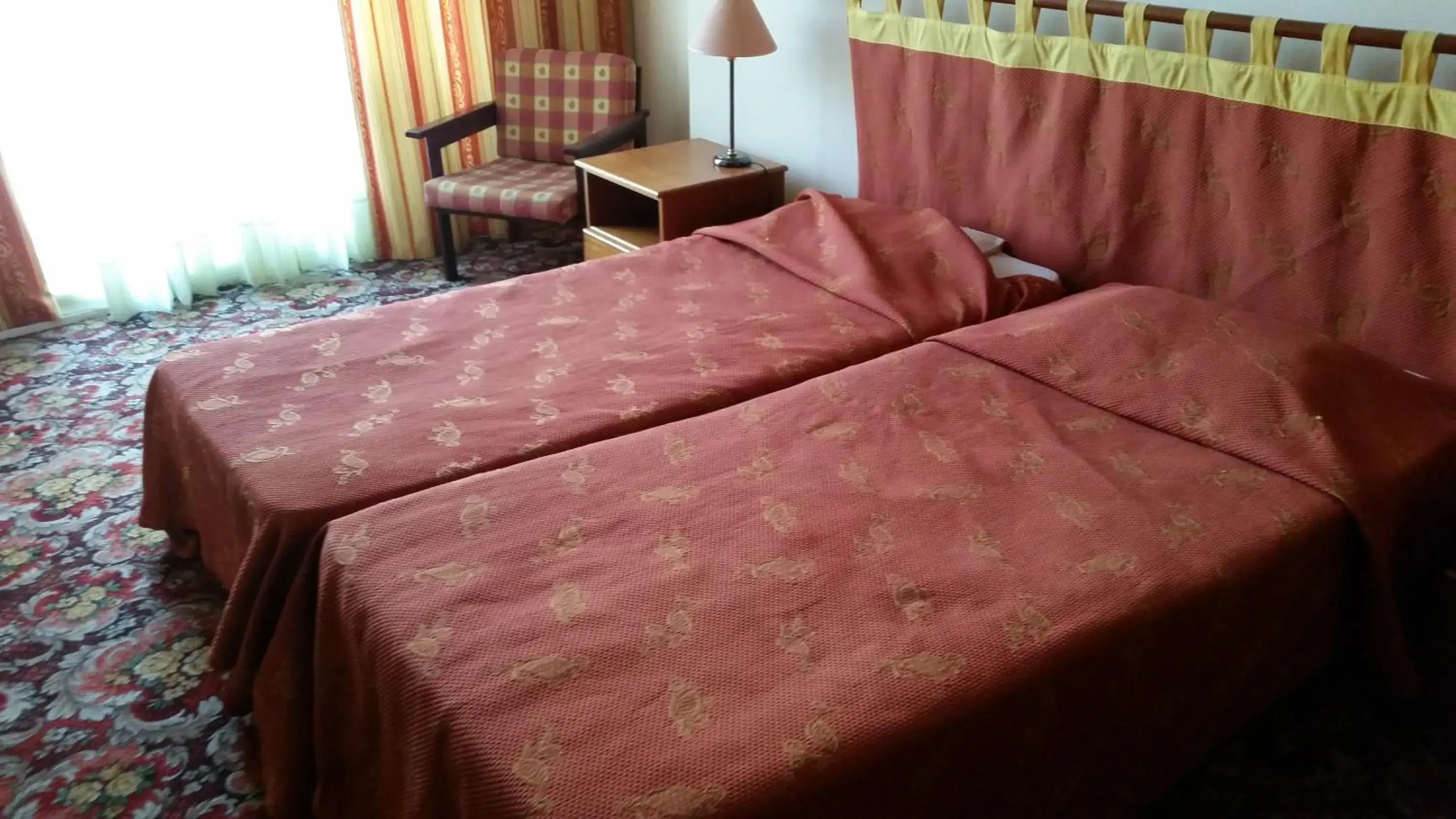 Bed, Room Photo in Sylva Hotel