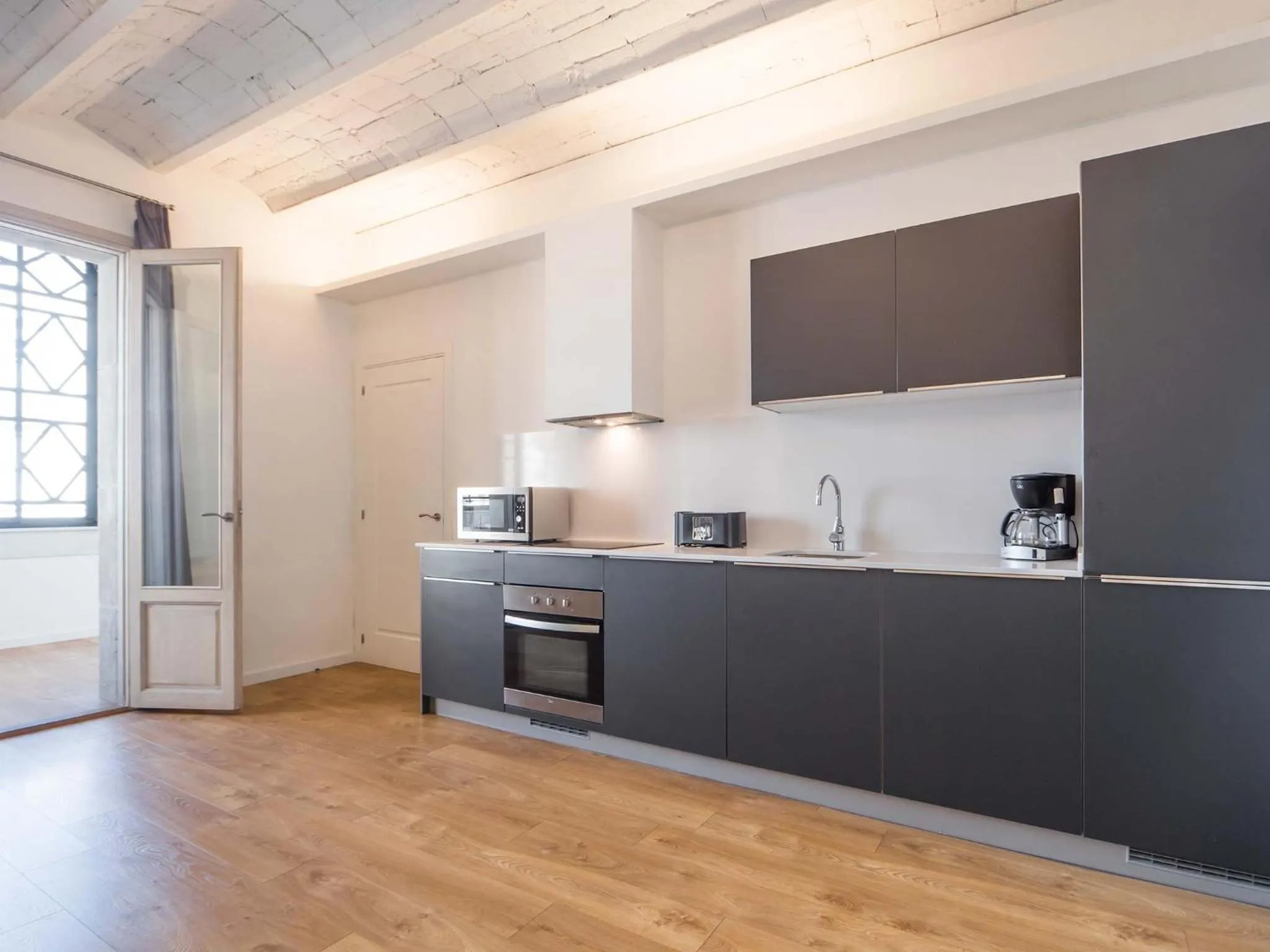 Kitchen or kitchenette in Rent Top Apartments Rambla Catalunya