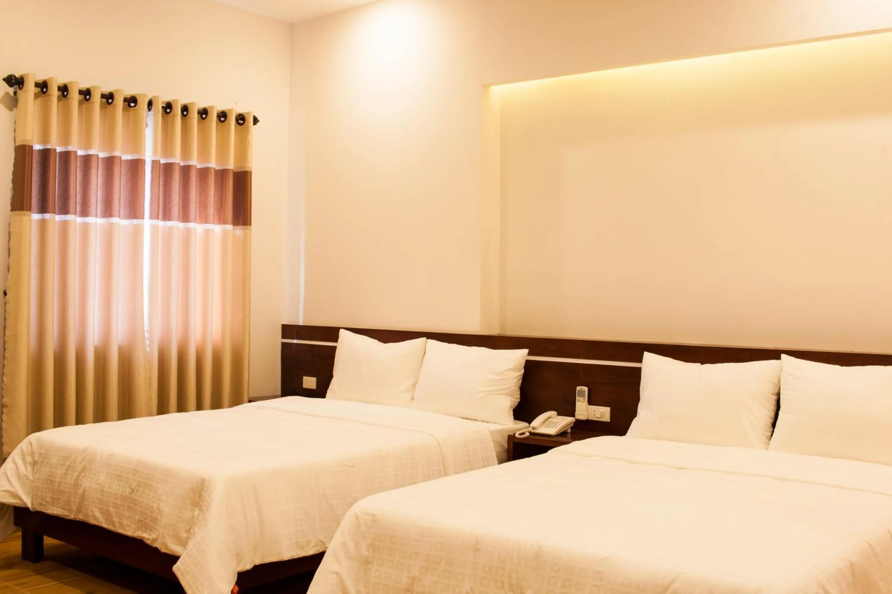 Bed in Phuong Linh Hotel