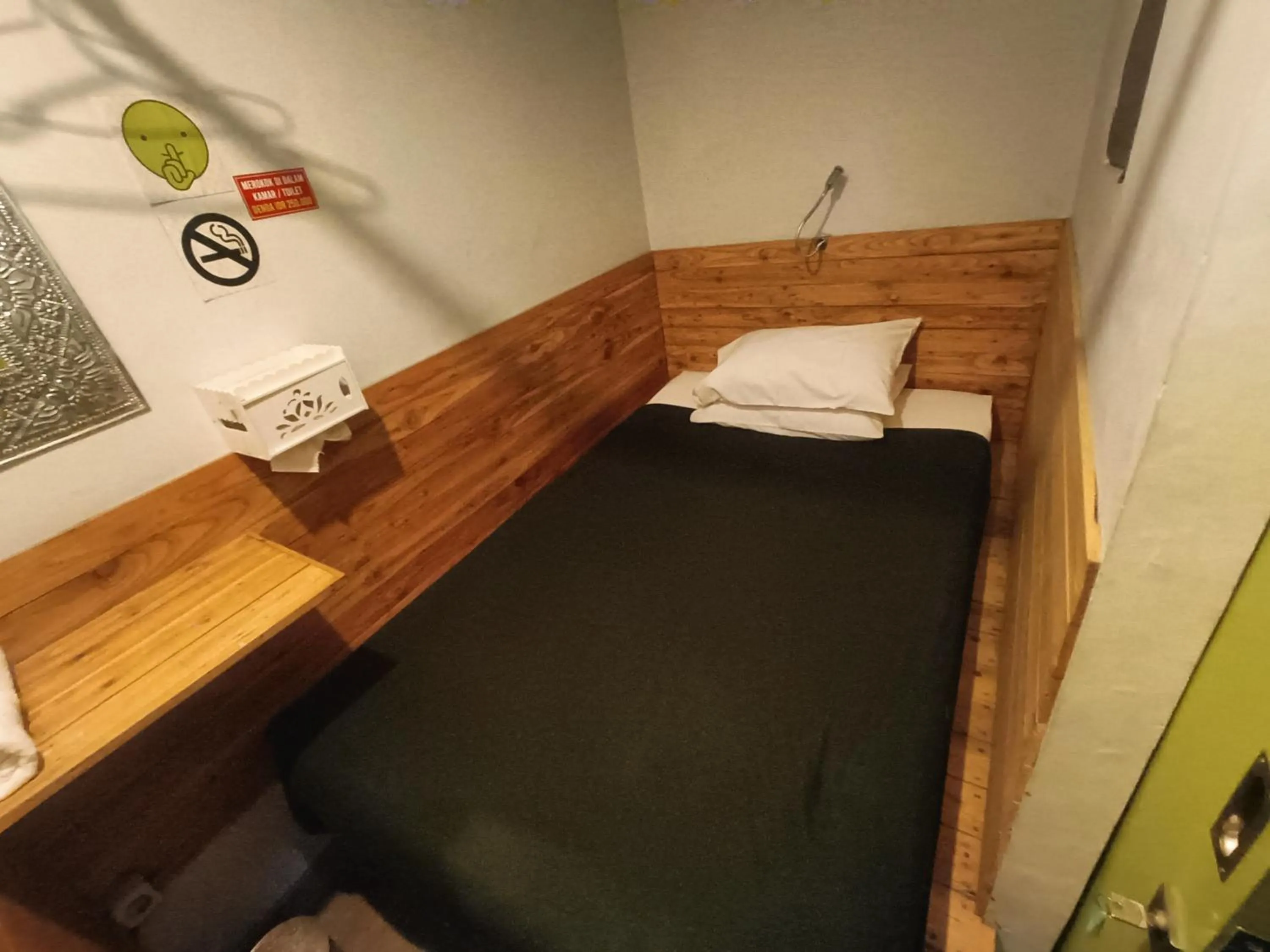 Bed in Jeng Tini Guest House