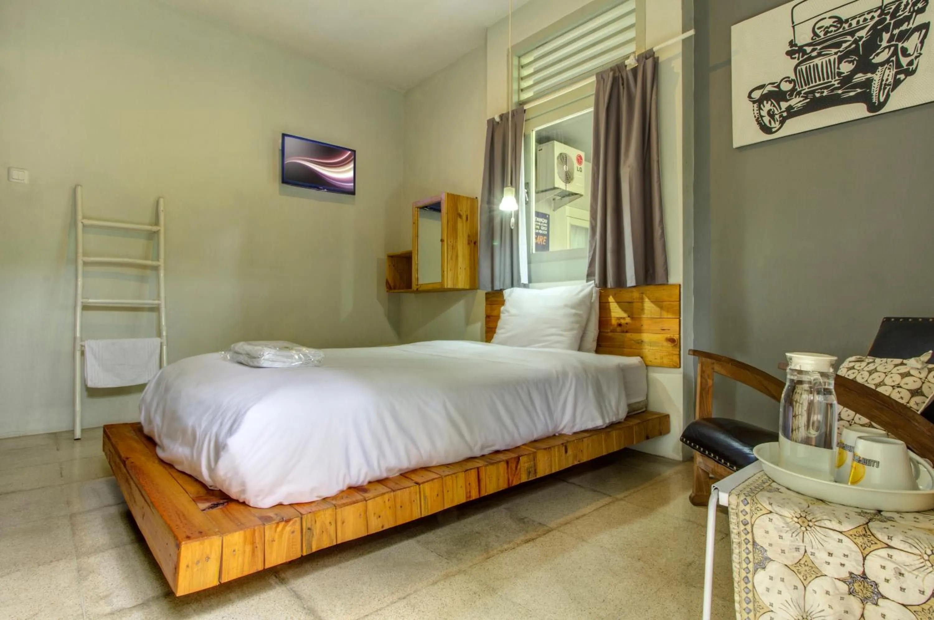 Bed in Jeng Tini Guest House