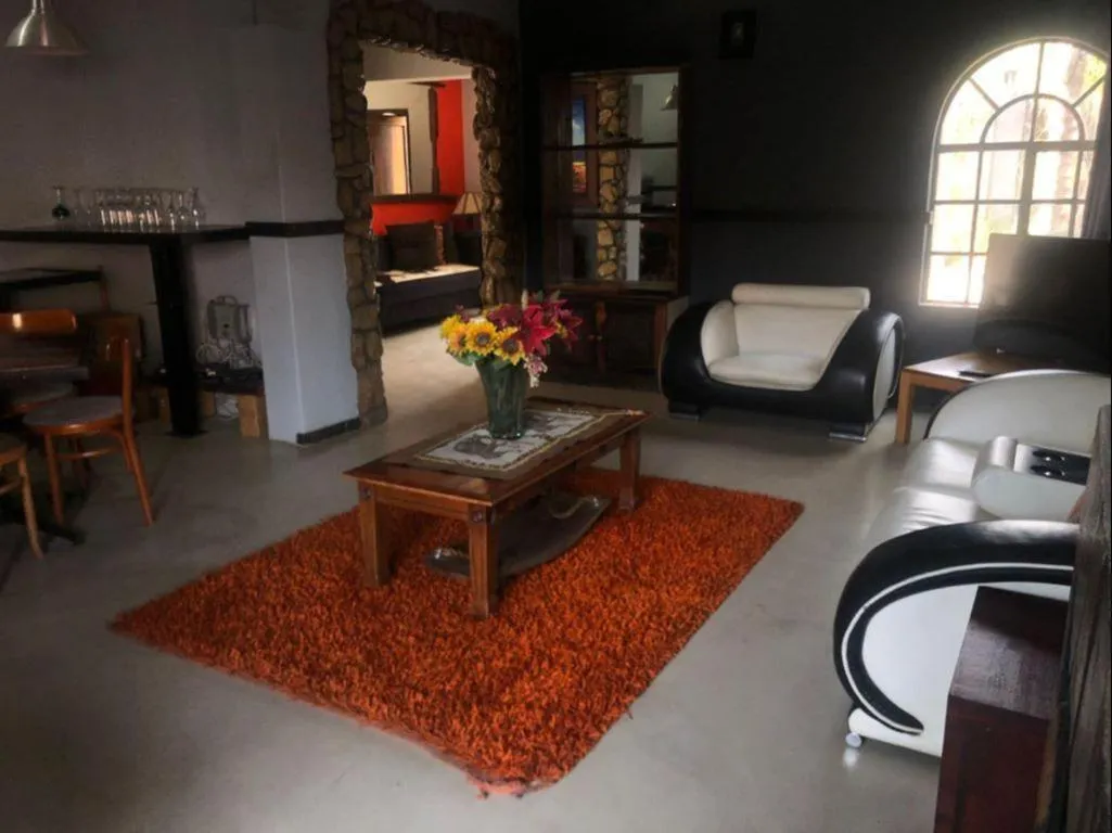 Communal lounge/ TV room in Africa Footprints Lodge Kempton Park