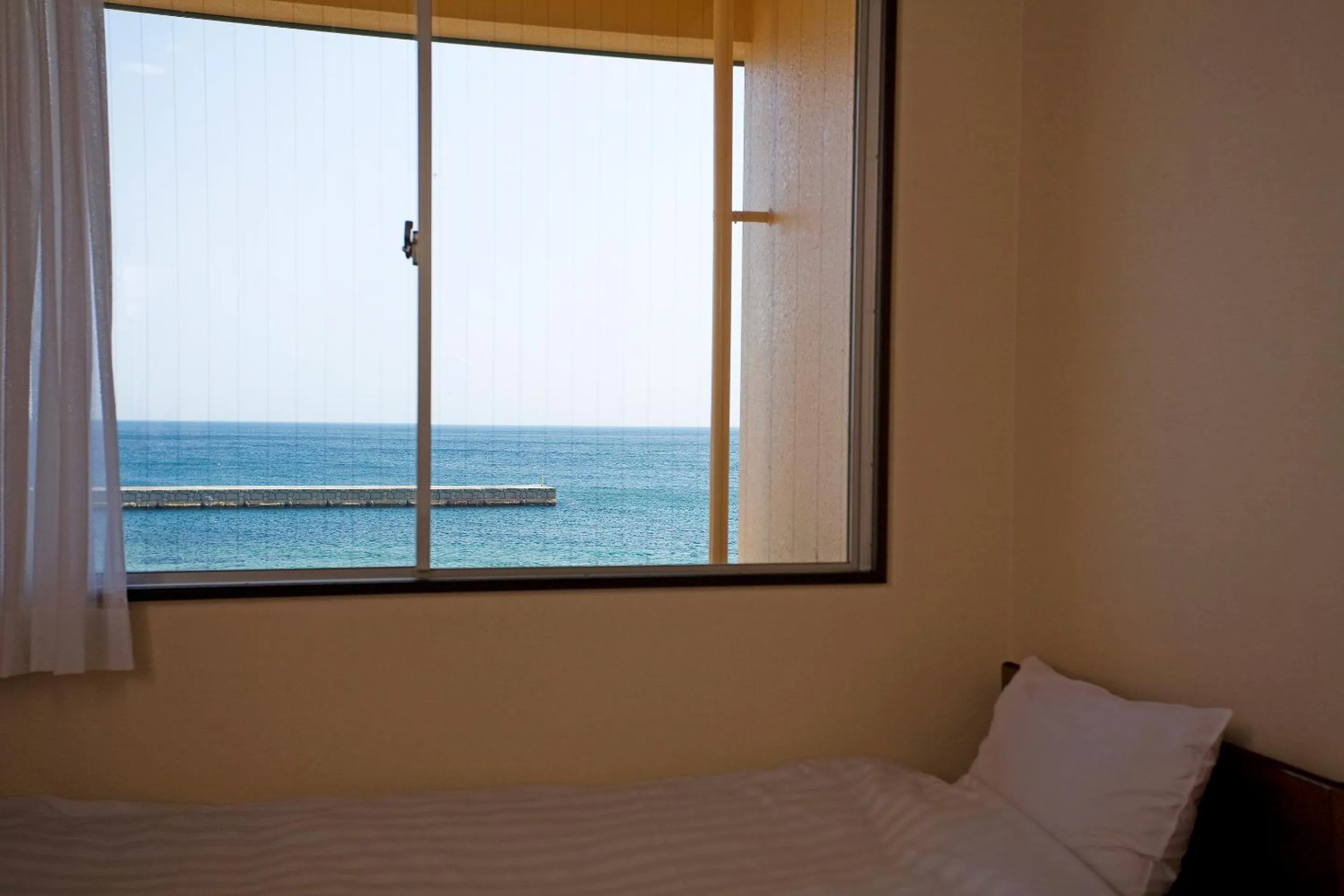 Sea view, Bed in Harbor Hotel Kaigetsu