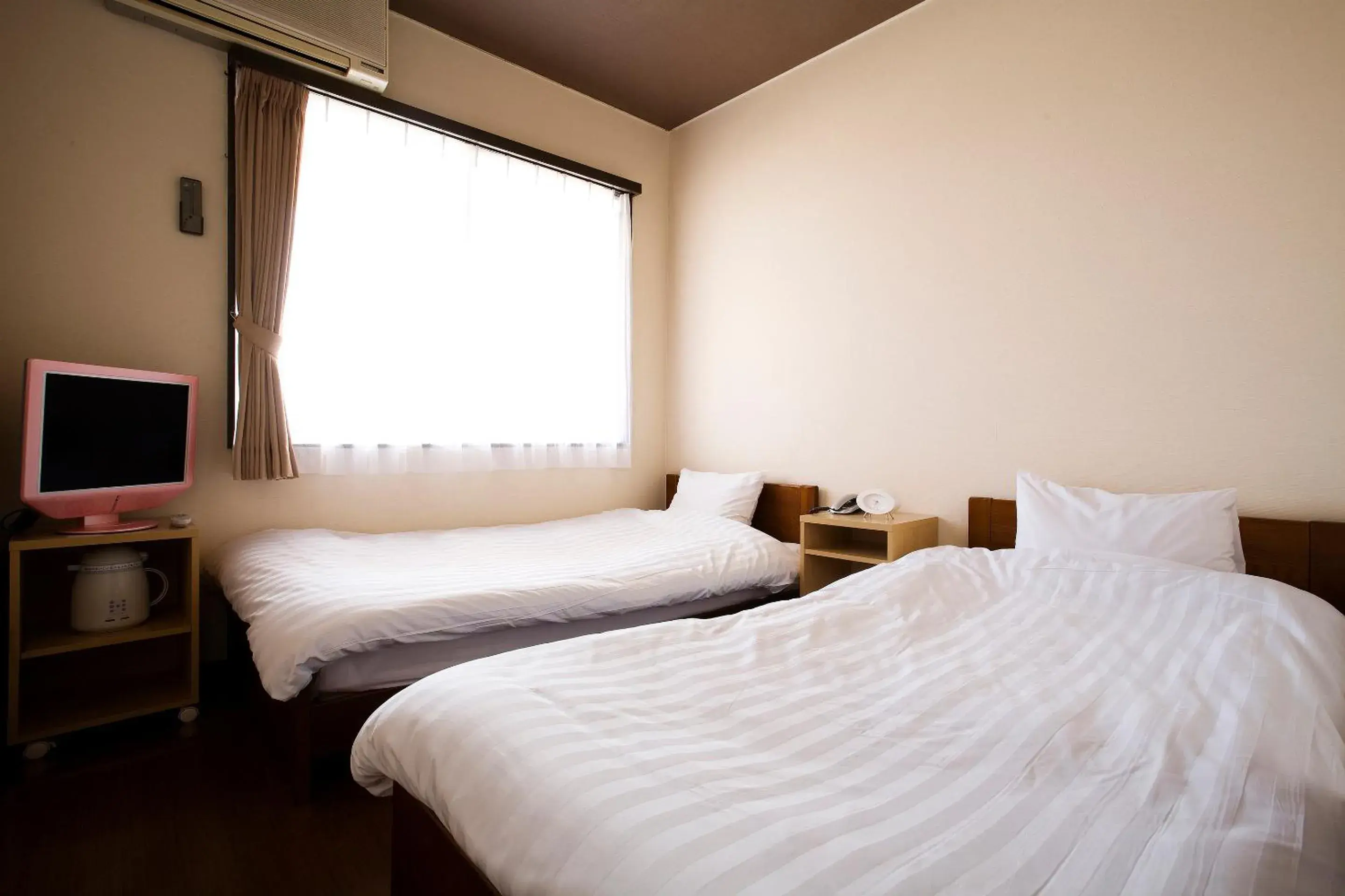 Photo of the whole room, Bed in Harbor Hotel Kaigetsu Photo of the whole room, Bed in Harbor Hotel Kaigetsu