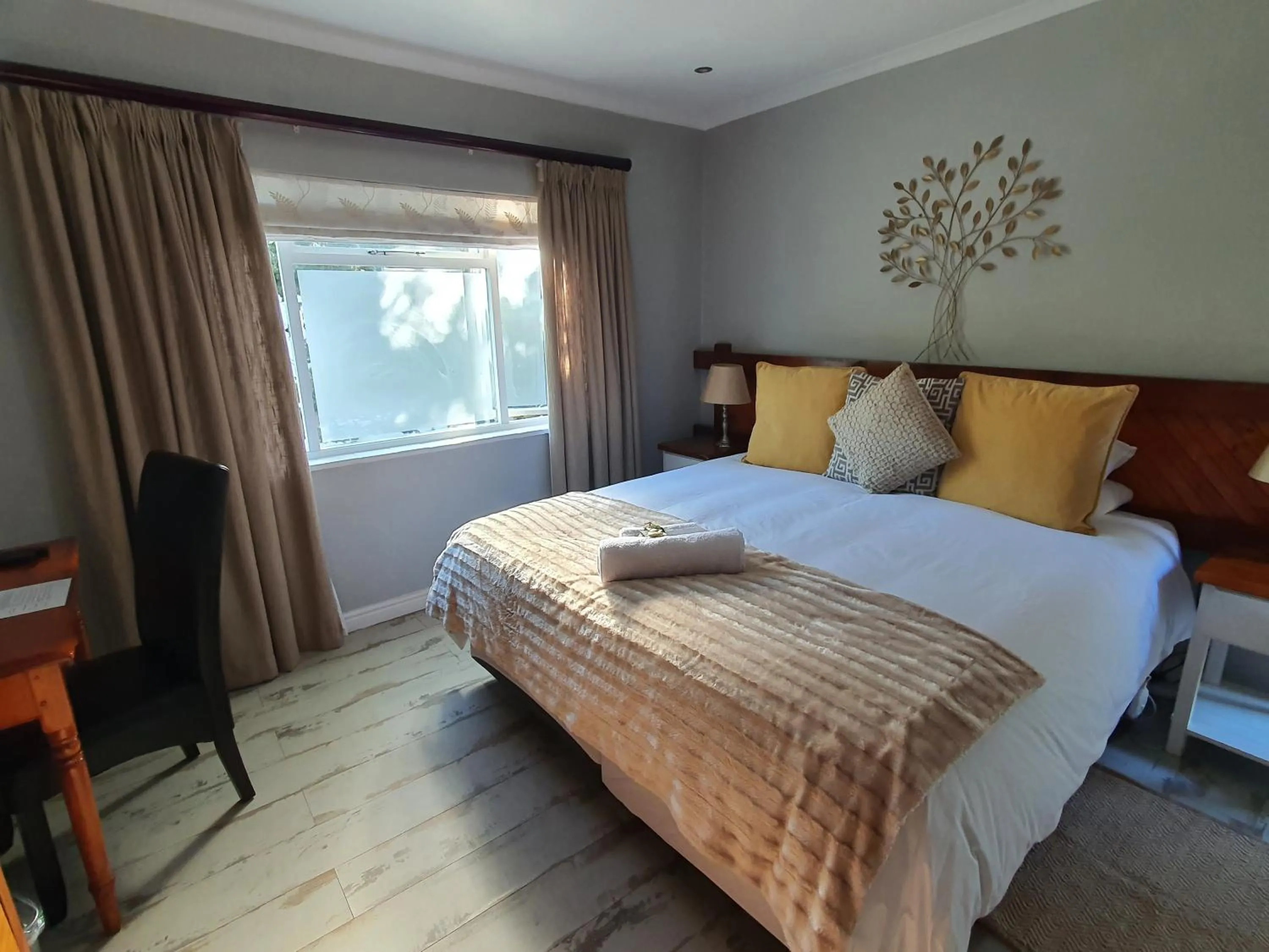 Bed in Wild Olive Guest House & Villa