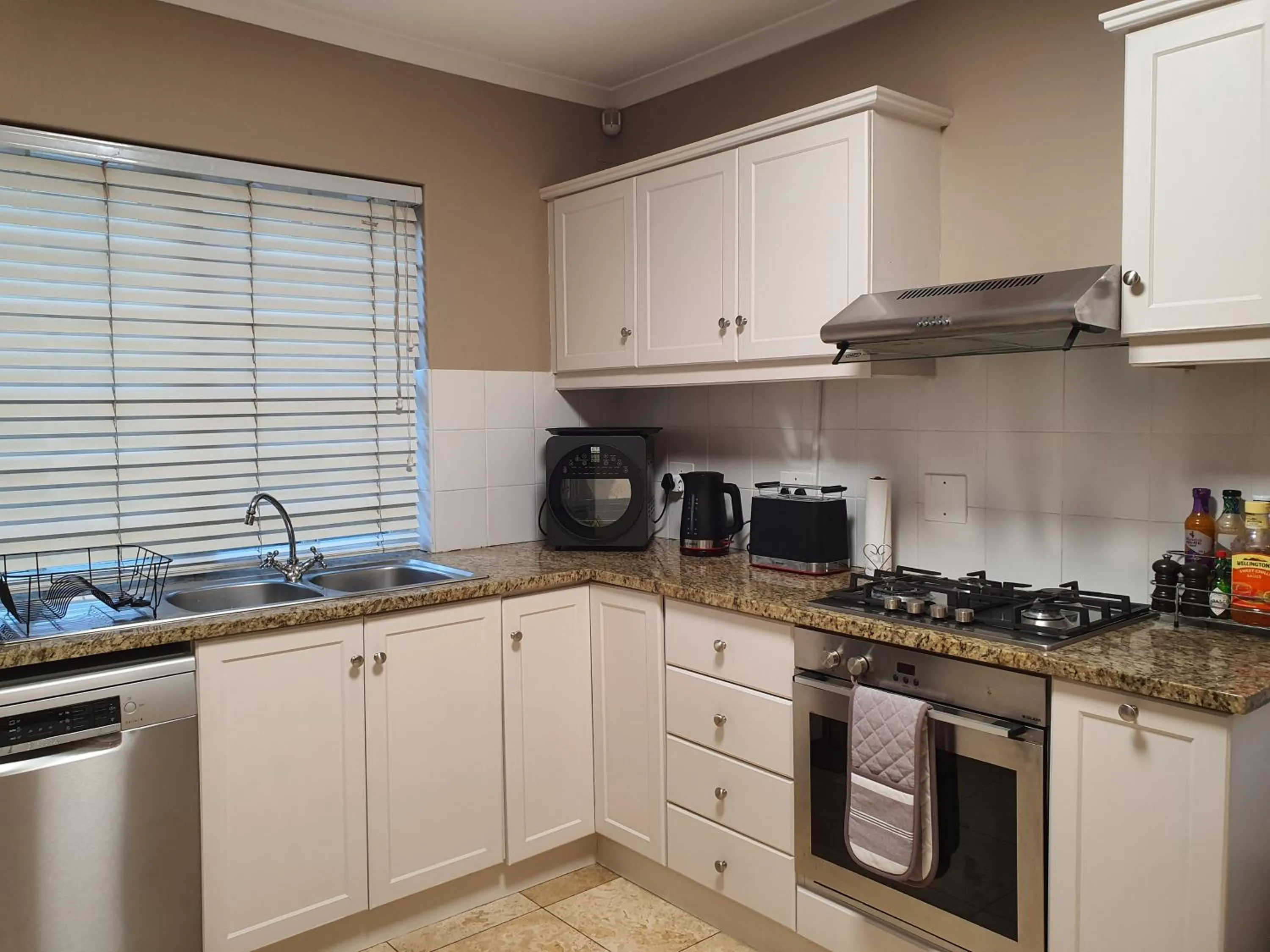 Kitchen or kitchenette in Wild Olive Guest House & Villa