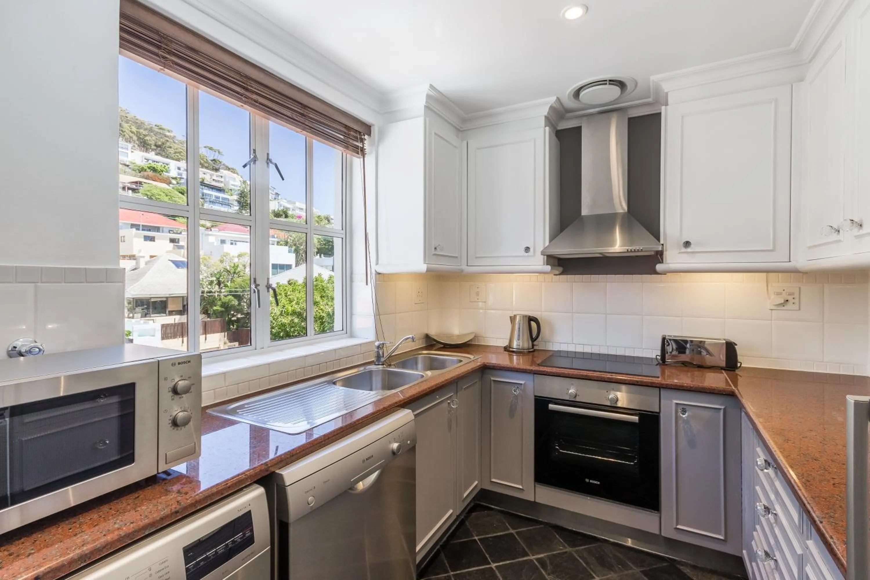 Kitchen or kitchenette in Romney Park Luxury Apartments by The Stay Collection