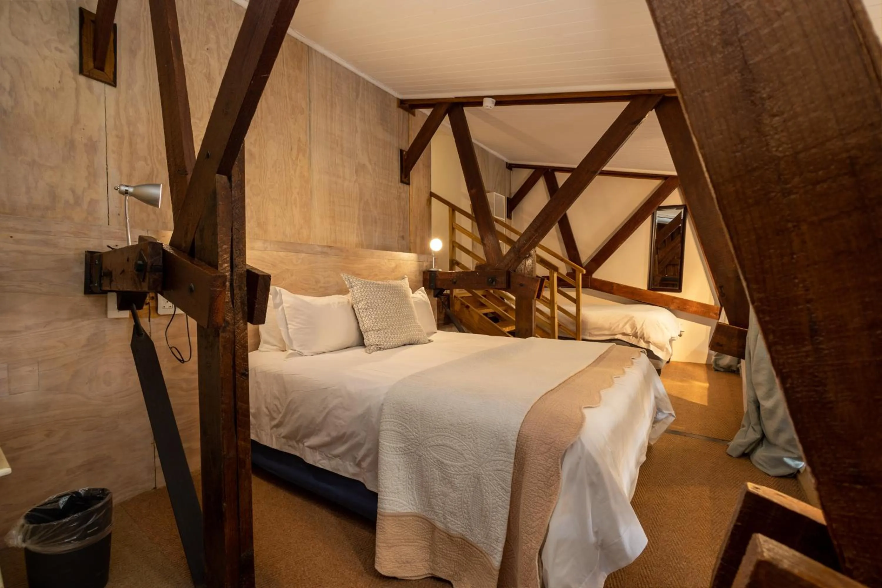 Bed in The Lofts Boutique Hotel