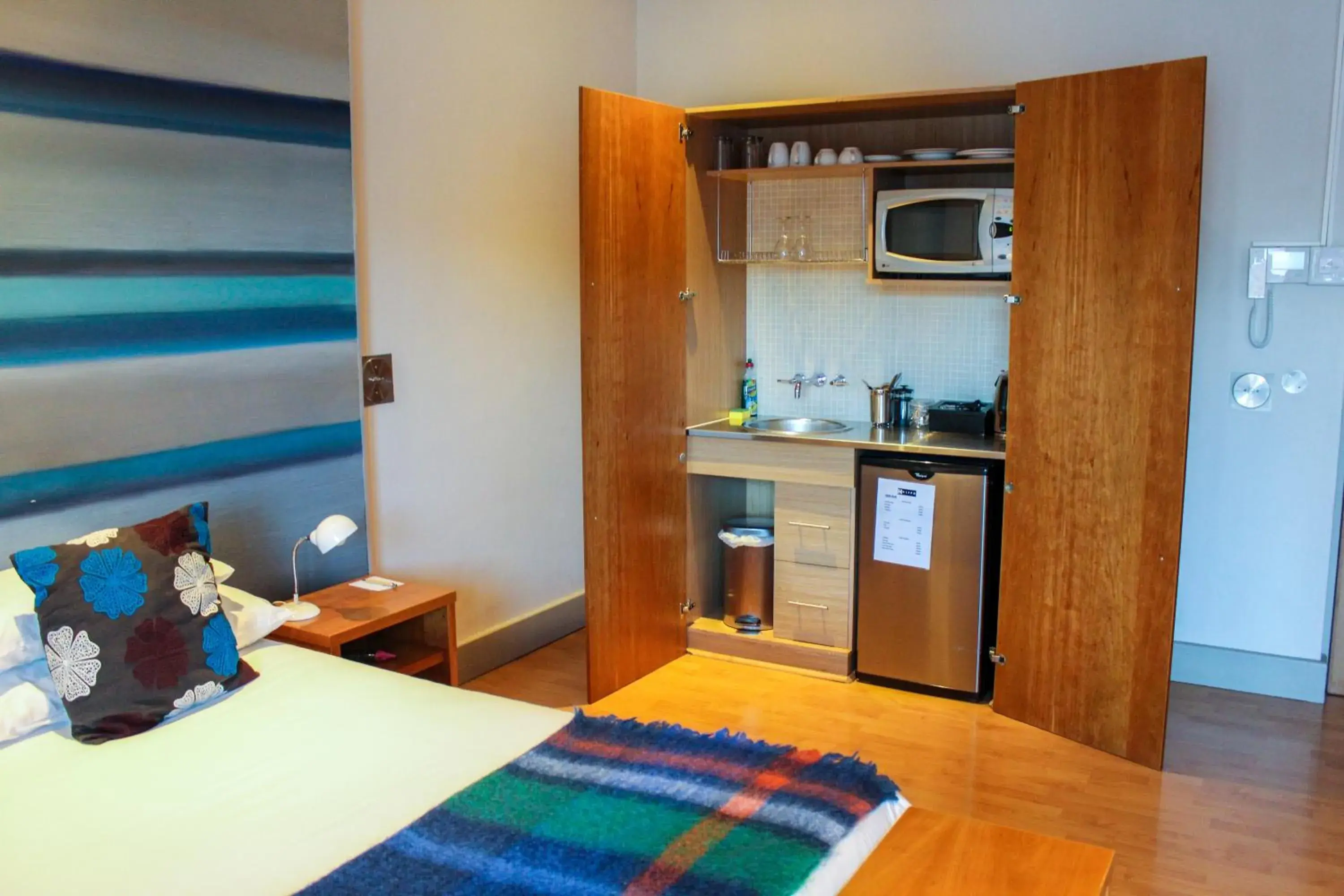 Kitchen or kitchenette, Bed in Hippo Boutique Hotel Kitchen or kitchenette, Bed in Hippo Boutique Hotel