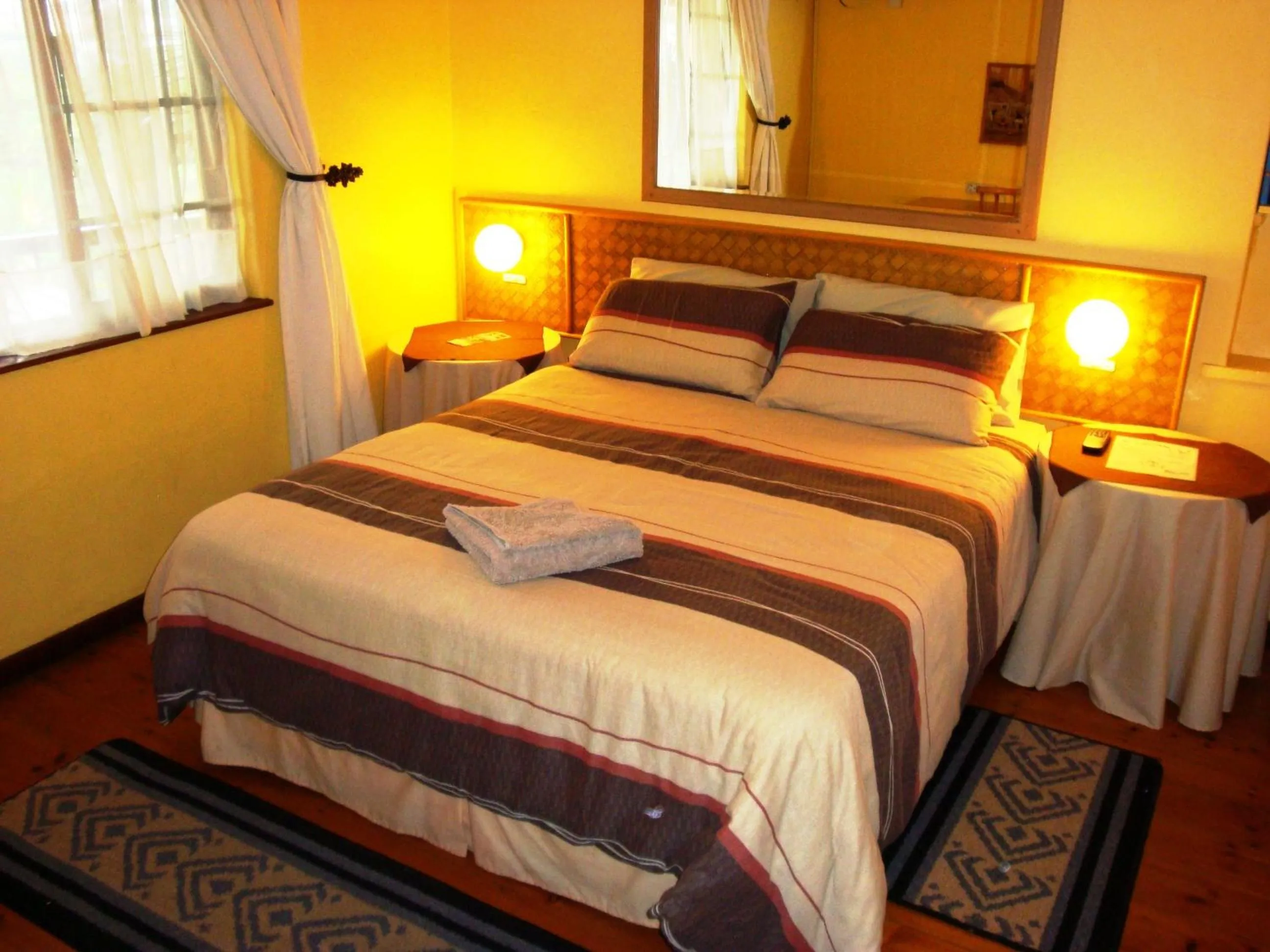 Bed in Flintstones Guest House Durban