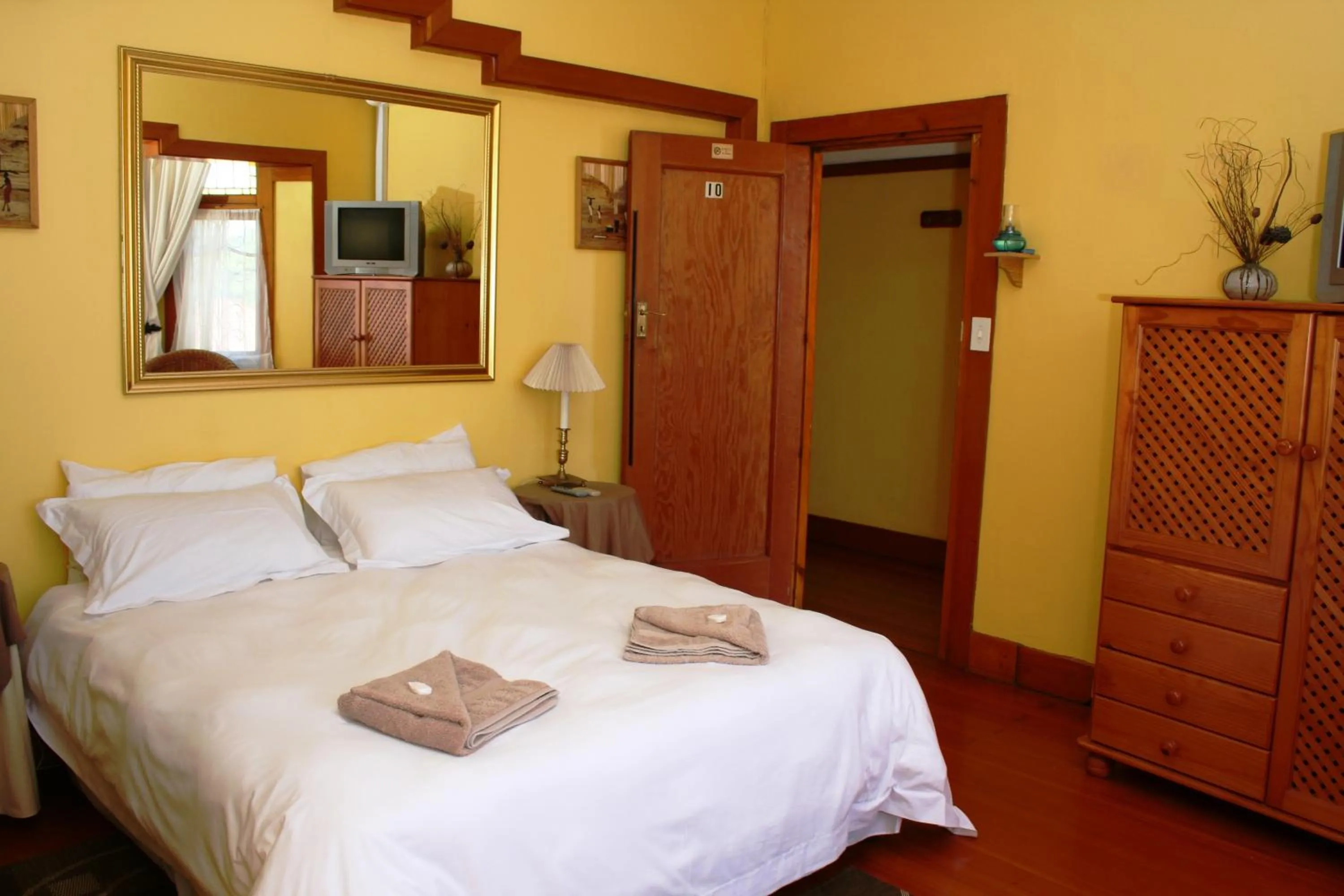 Bed in Flintstones Guest House Durban