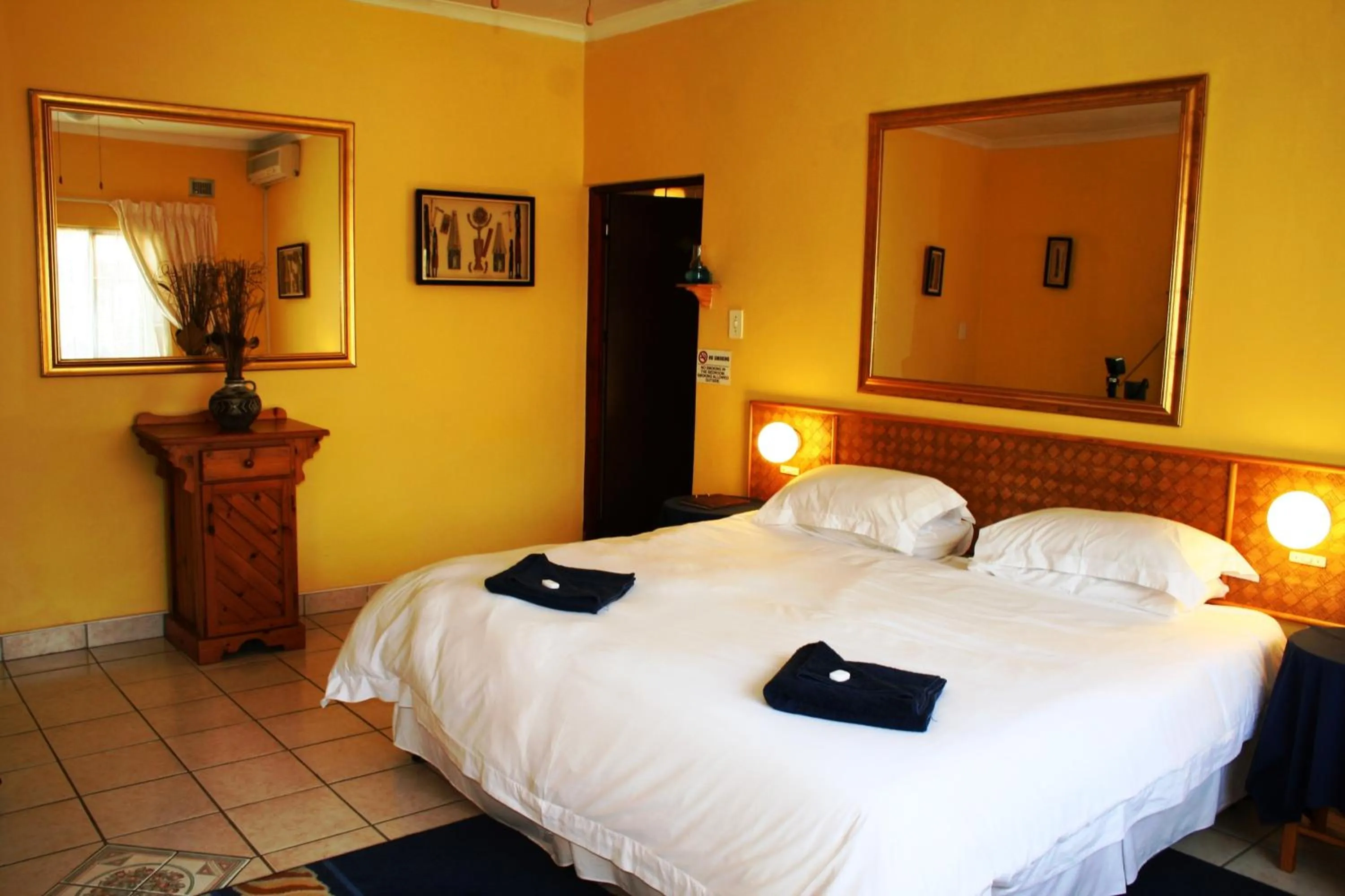 Bed in Flintstones Guest House Durban