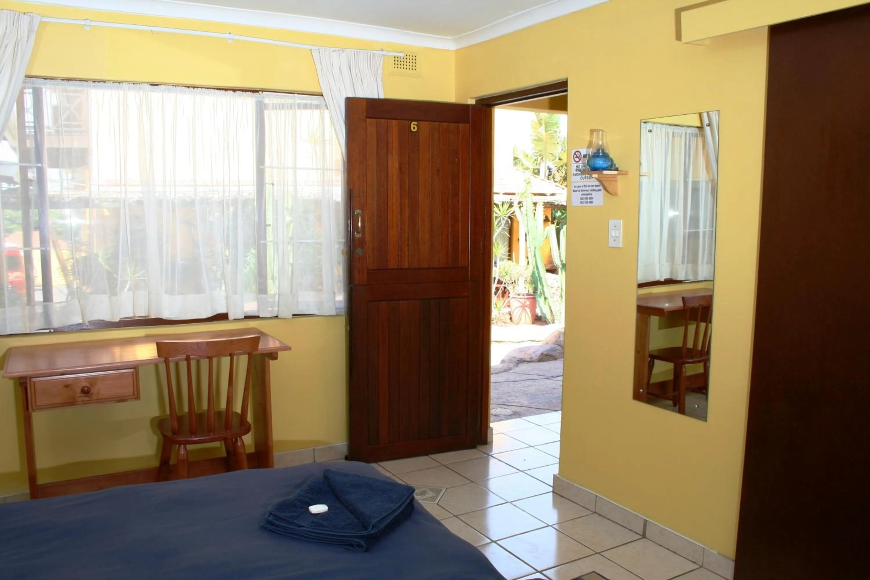 Bed in Flintstones Guest House Durban