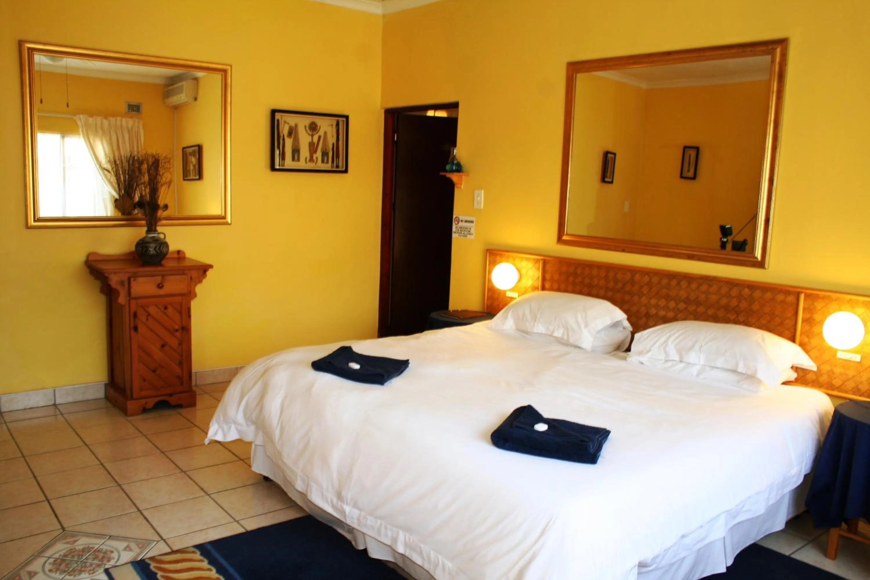 Bed in Flintstones Guest House Durban